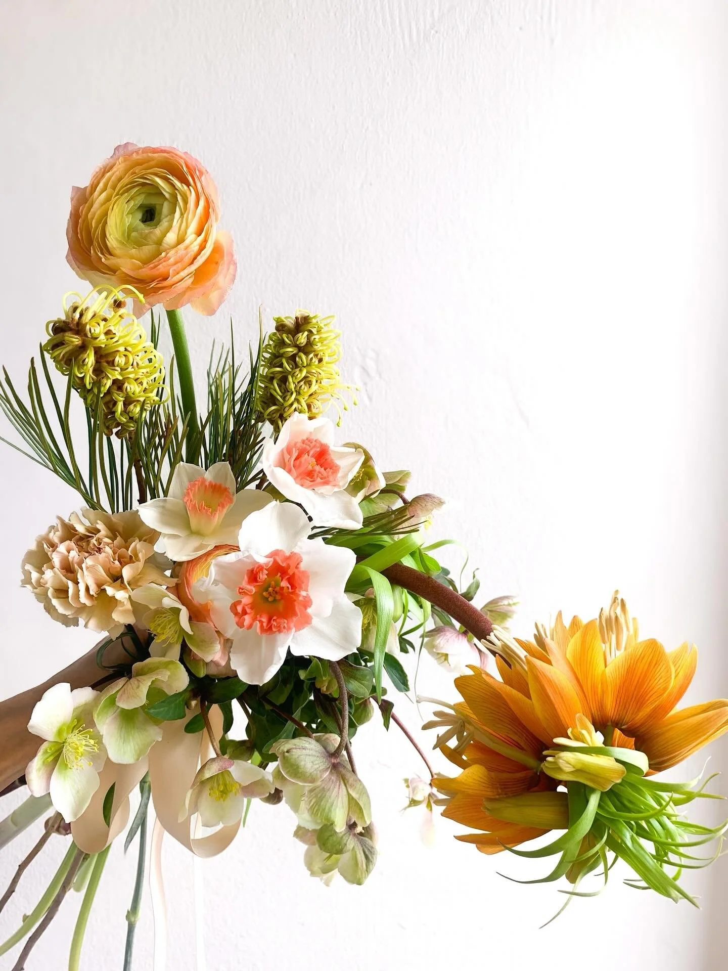 Woven Textures || Citrus swirls, salmon ruffles &mdash; eccentric forms and garden whimsy sculpted into an unexpected silhouette.

For more bouquet inspiration, explore our collection at inashea.com or browse our Highlights.