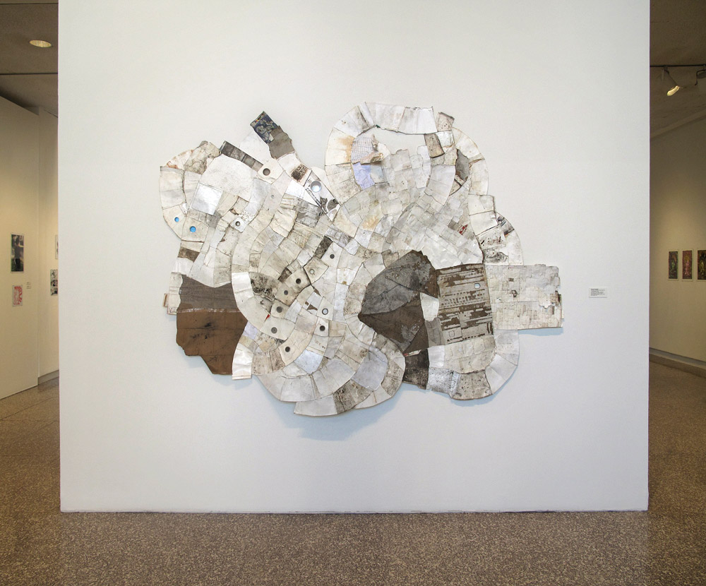 Spandrel (Leslie, MI to Hastings, MI) 2009, found paper, Styrofoam, and plastic (throwaway materials gathered on collection-walks) 96¨ x 80¨ x 5¨