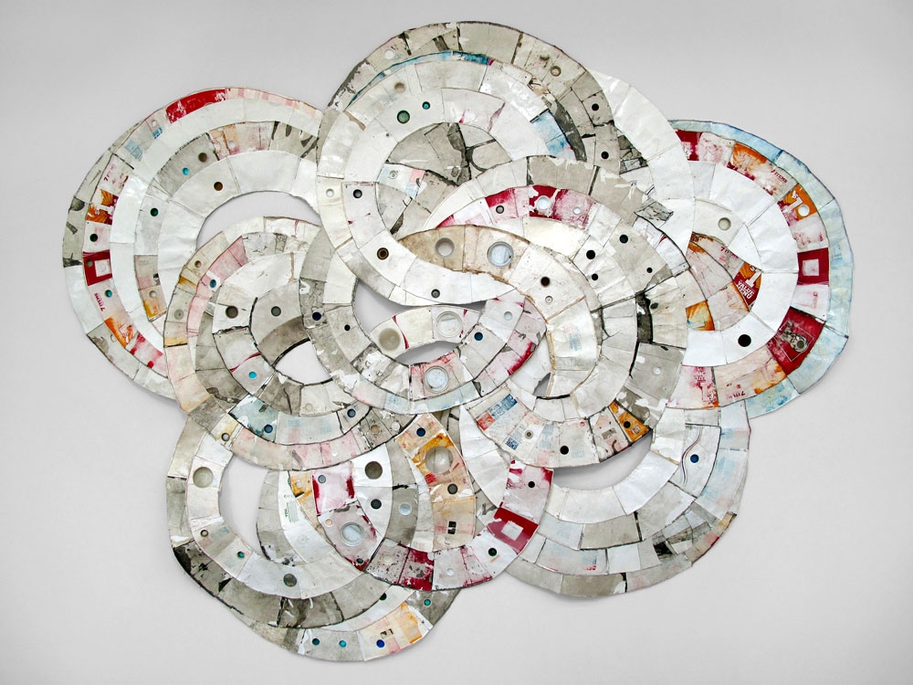 Moly (Kennan, WI to Eau Claire, WI) 2010, found paper, Styrofoam, and plastic (throwaway materials gathered on collection-walks); 120¨ x 90¨ x 4¨