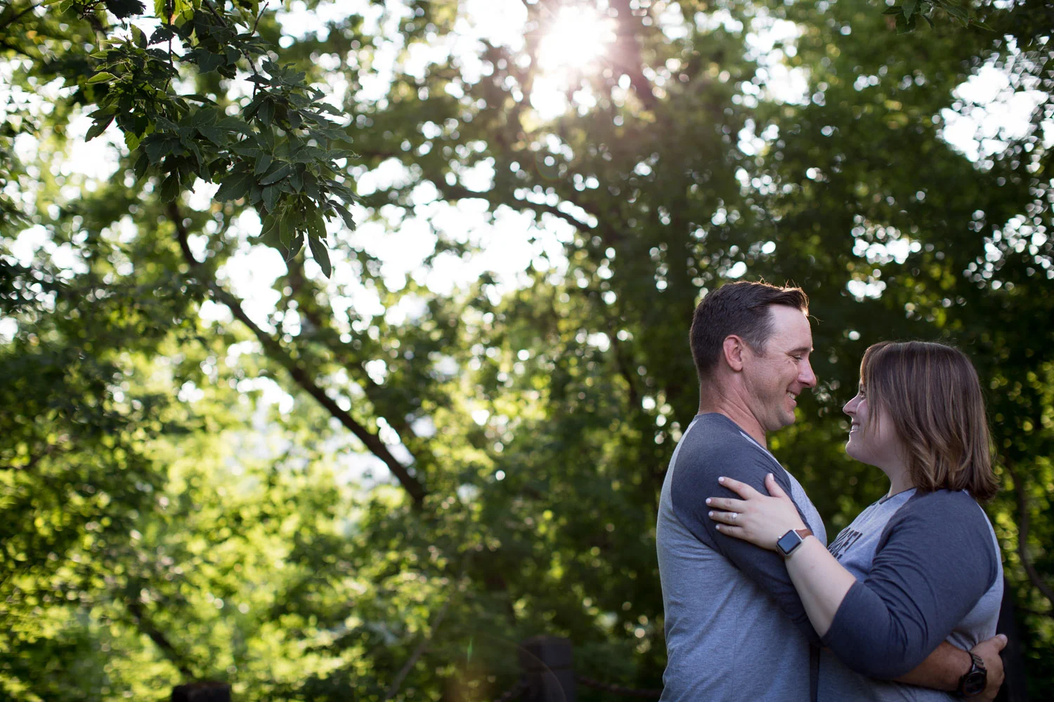11-minneapolis-engagement-photographer-st-anthony-and-main-green-trees-golden-hour-sunset-mahonen-photography.jpg