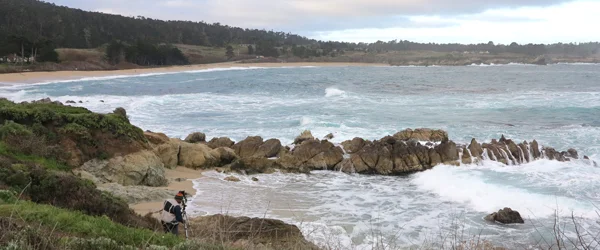 Photographer at Monastery Beach Carmel CA