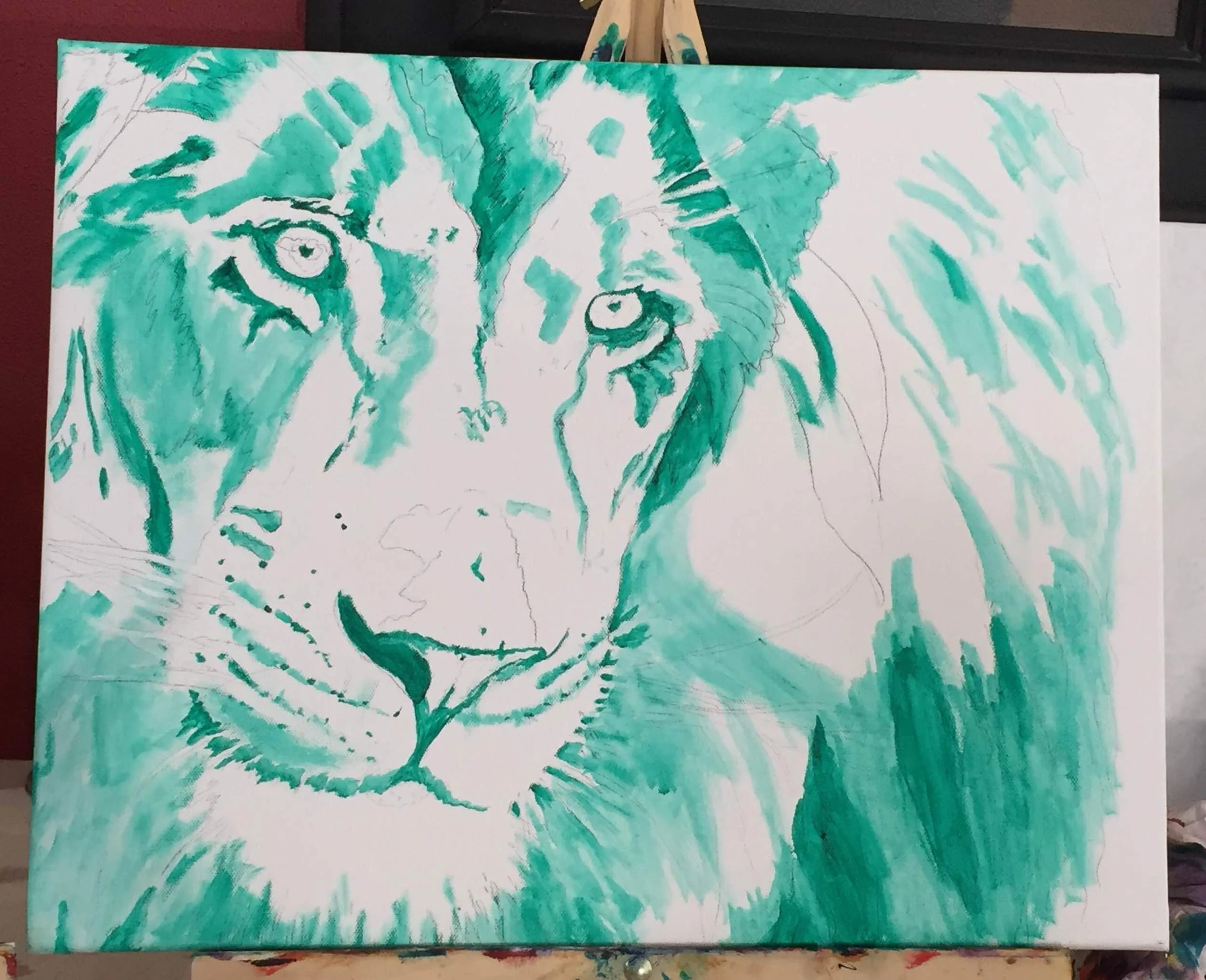 Mary begins her process by doing a value study, using one color to lay out the light and dark areas.
