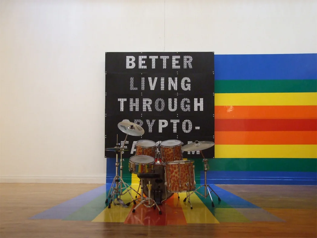 BACKGROUND: ‘Better Living Through Crypto-Fascism’ (2011); FOREGROUND: ‘Pizza Drumkit OMG’ (2011).