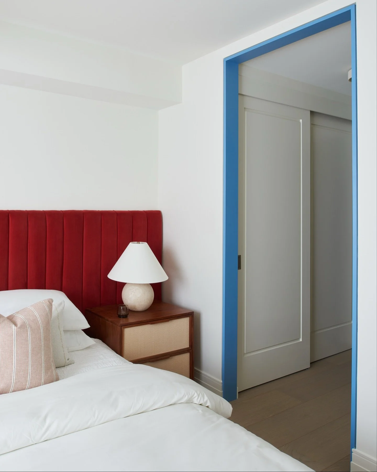 A vibrant velvety headboard paired with contrasting blue trims bring this small space to life
.
Project #SPxSummerHillCondo 
.
.
.
#interiordesignertoronto #bedroomdesign #colourstory #velvetheadboard #modernvintage #designwithcolour #refinedliving