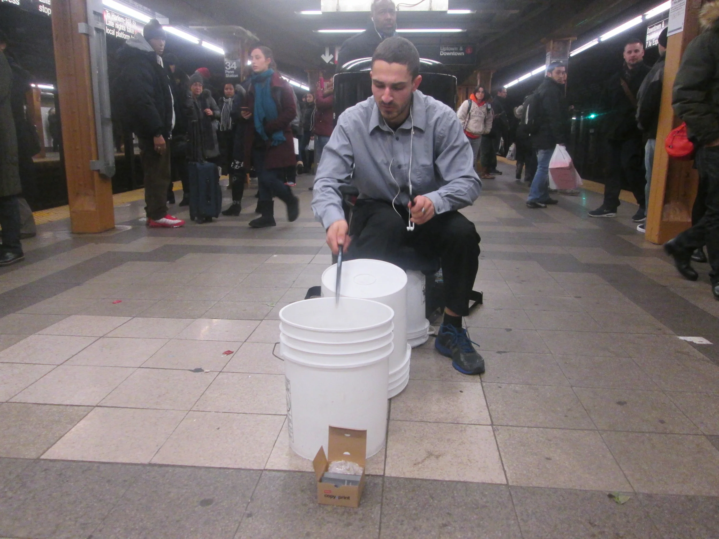Panos, a bucket drummer performing at 34th Street and 7th Avenue Station, 2016