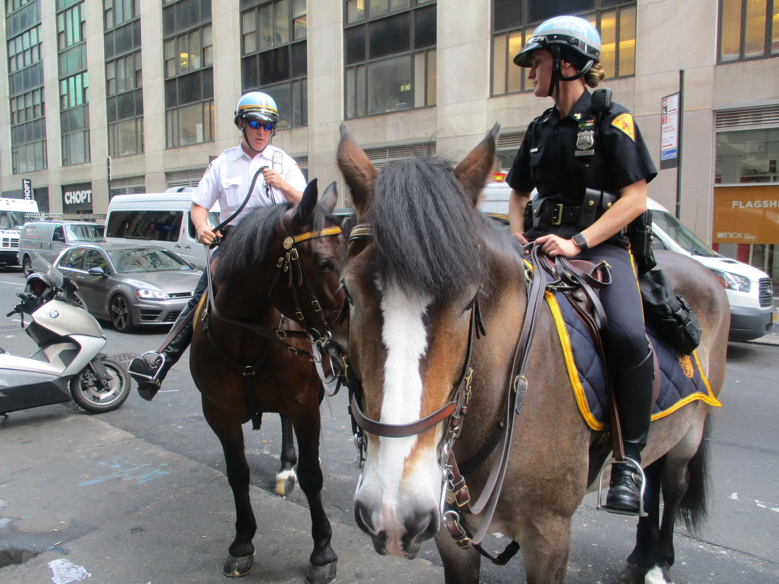 Two New York City mounted police officers on 41st Street just off Time Square main through fare, 2017