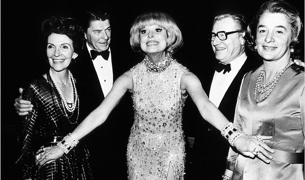  Carol Channing with 40th U.S. President Ronald Reagan and New York Governor Nelson Rockefeller backstage at the opening of “Hello Dolly.” © Christopher Little 