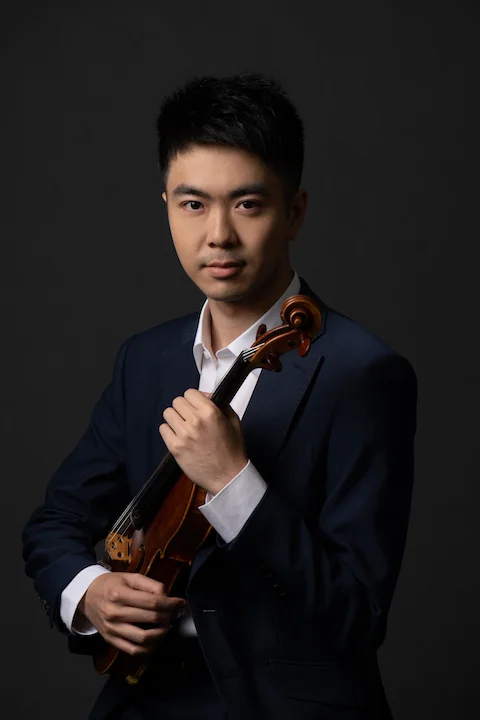 Chik with violin low rest.jpg