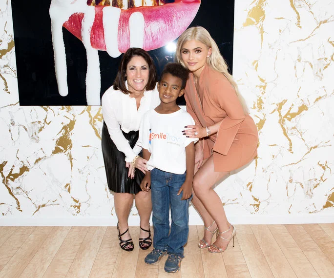 Kylie Jenner with Smile Train CEO Susie Schaefer and Former Patient After Donating Close to $160,000 From the Sale of Her Special Edition Lip Kit