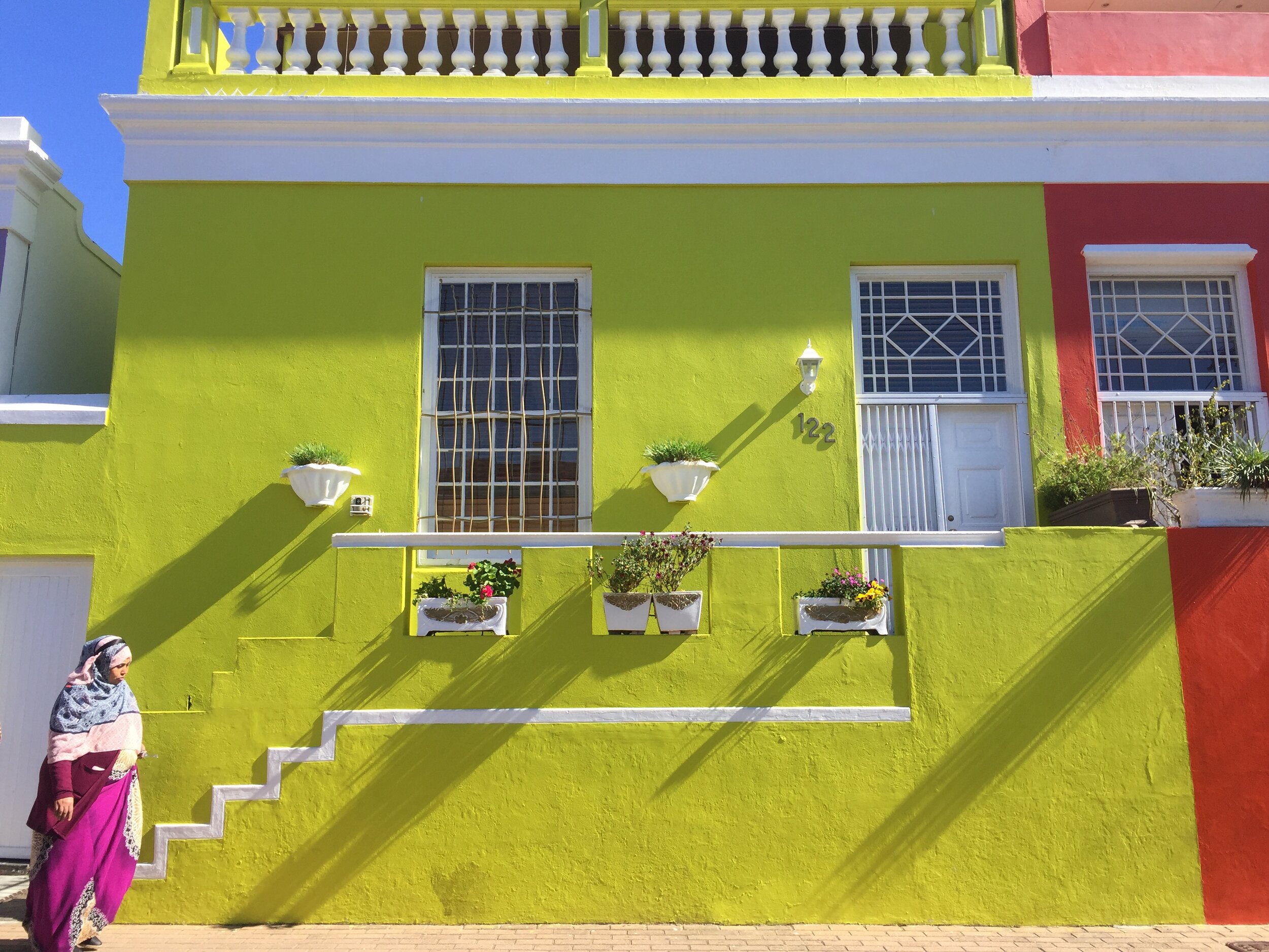 The historic Bo-Kaap neighborhood of Cape Town, formerly known as the Malay Quarter, is a historic muslim district and cultural center. The neighborhood was once the spot where slaves brought from Malaysia, India and other parts of Africa were first free to settle. It is known for its brightly colored homes, Cape Malay museum and cobbled streets.