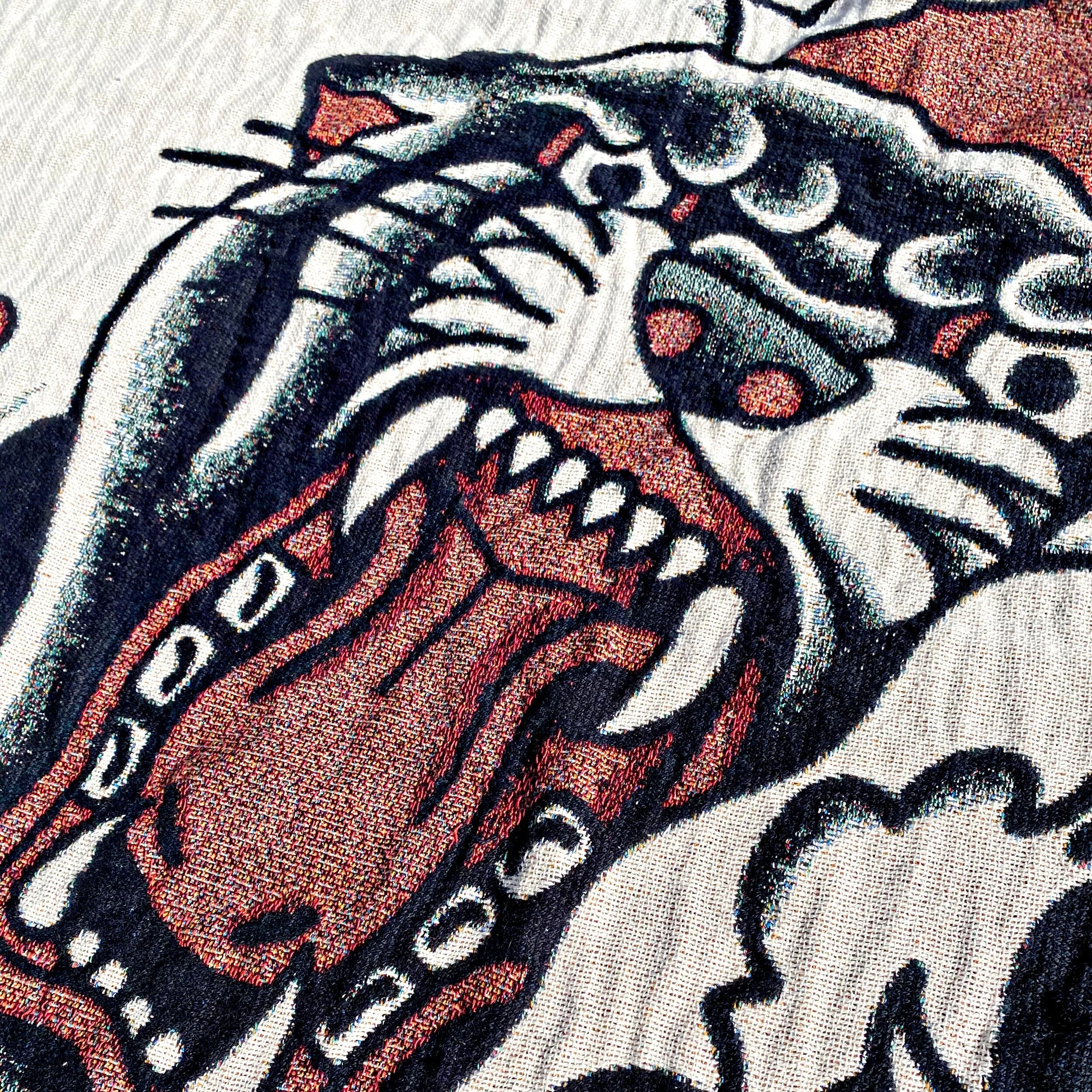 panther-tear-rip-tattoo