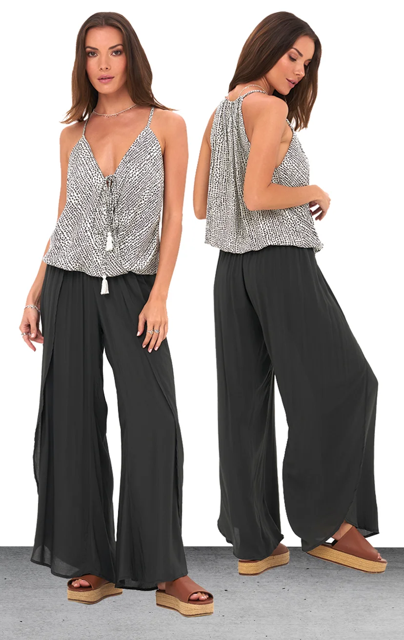 TOP PALOMA Spaghetti strap racer- back, surplice front with tassel tie top 100% COTTON | XS-S-M-L – PANT MAILE Wrap style pant, elastic waist 100% RAYON | XS-S-M-L