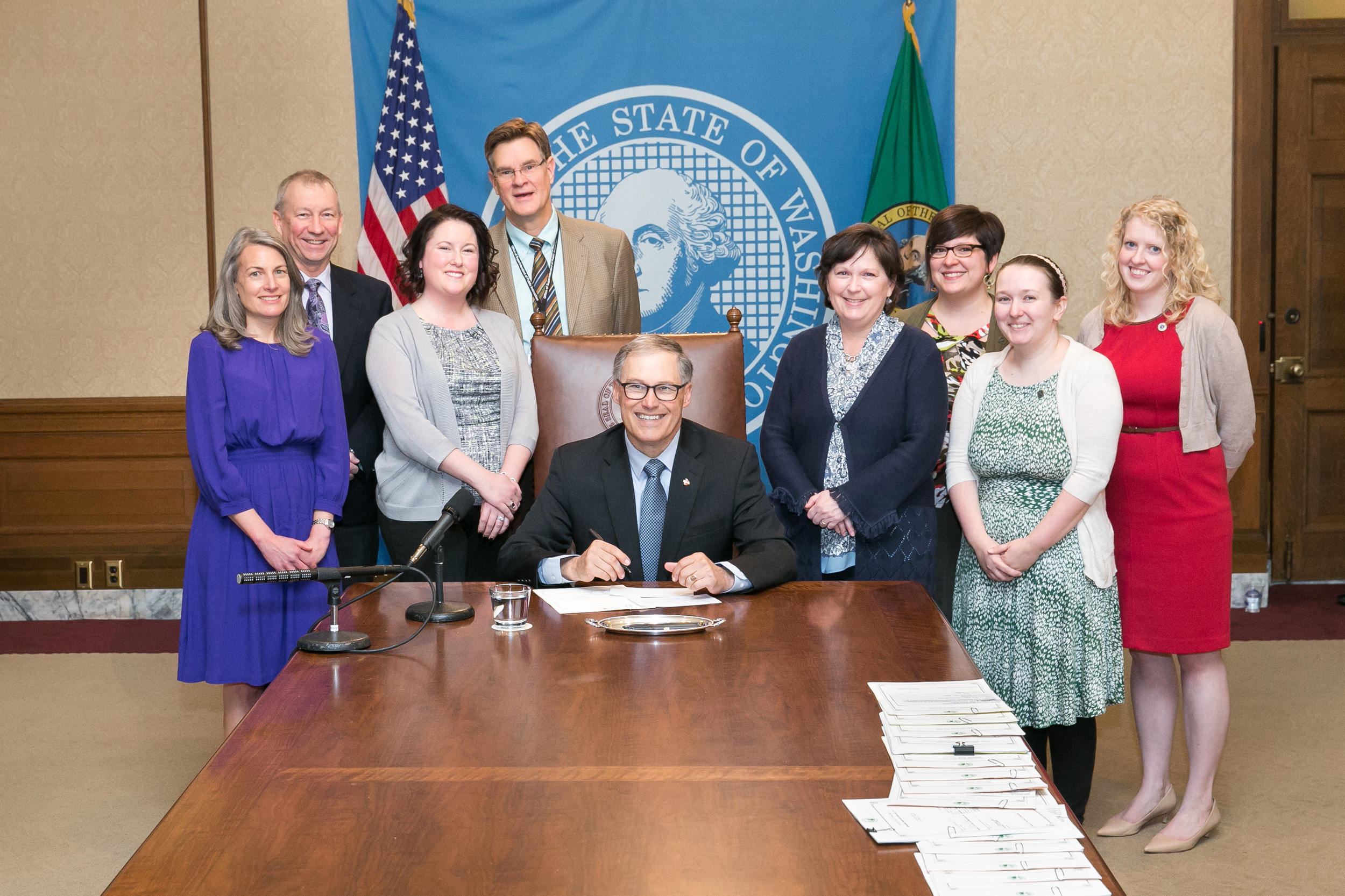 Teachers United at the signing of House Bill 1345. House Bill, which defines professional learning for teachers in the state of Washington, was signed into law by Governor Jay Inslee on March 31, 2016. To the right of Governor Inslee are three of Teachers United directors: Hope Teague-Bowling, Mary Moser, and Sara Ketelsen. Teachers United worked with our legislators to recommend policy and craft the language of the bill.
