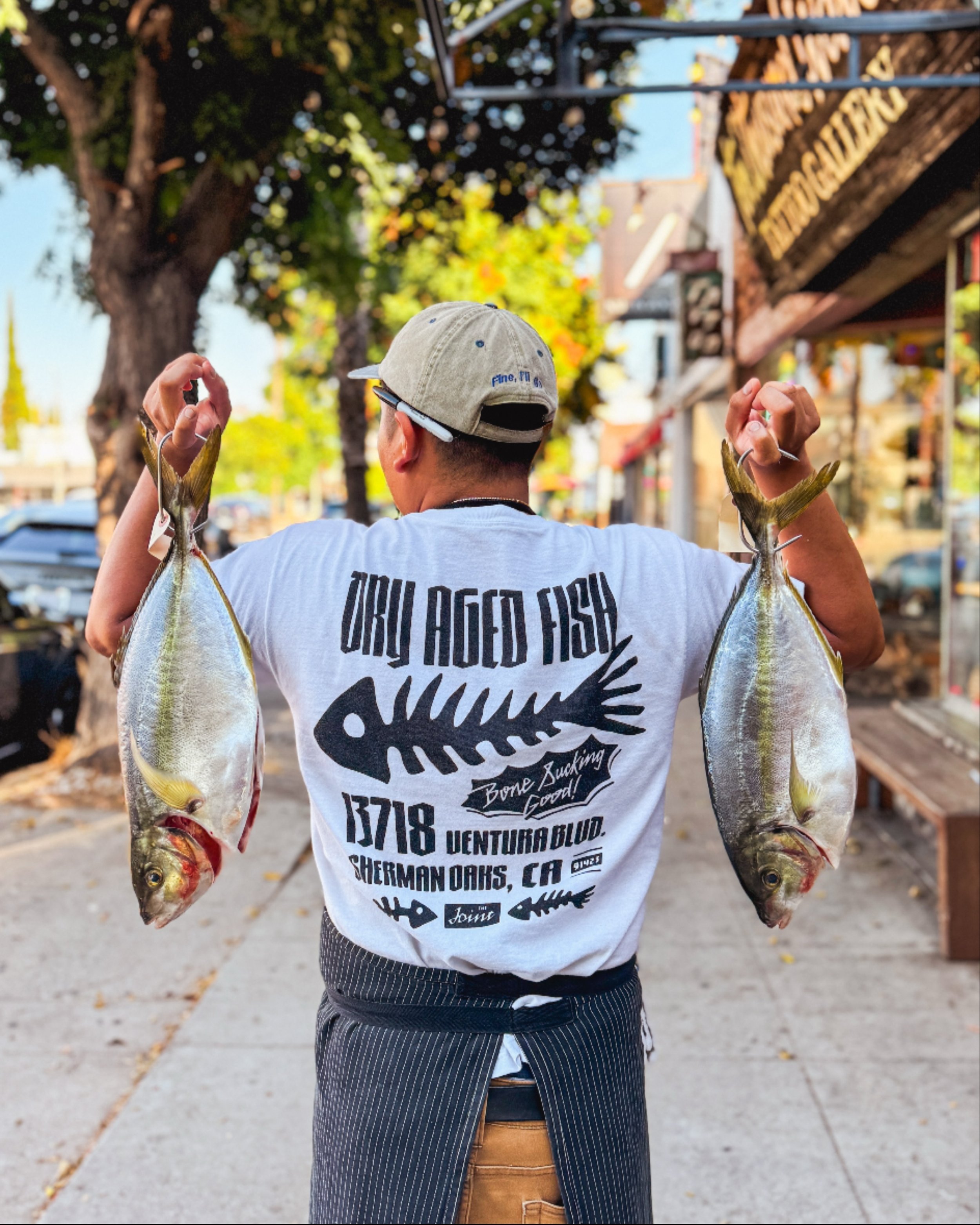 Striped Jack aka Shima Aji / popular as sushi and sashimi / it has a firm, springy texture and is slightly oily / flavor is clean and sweet, with a moderate amount of umami. 

PS t-shirt is also available for sale on our website &amp; in store