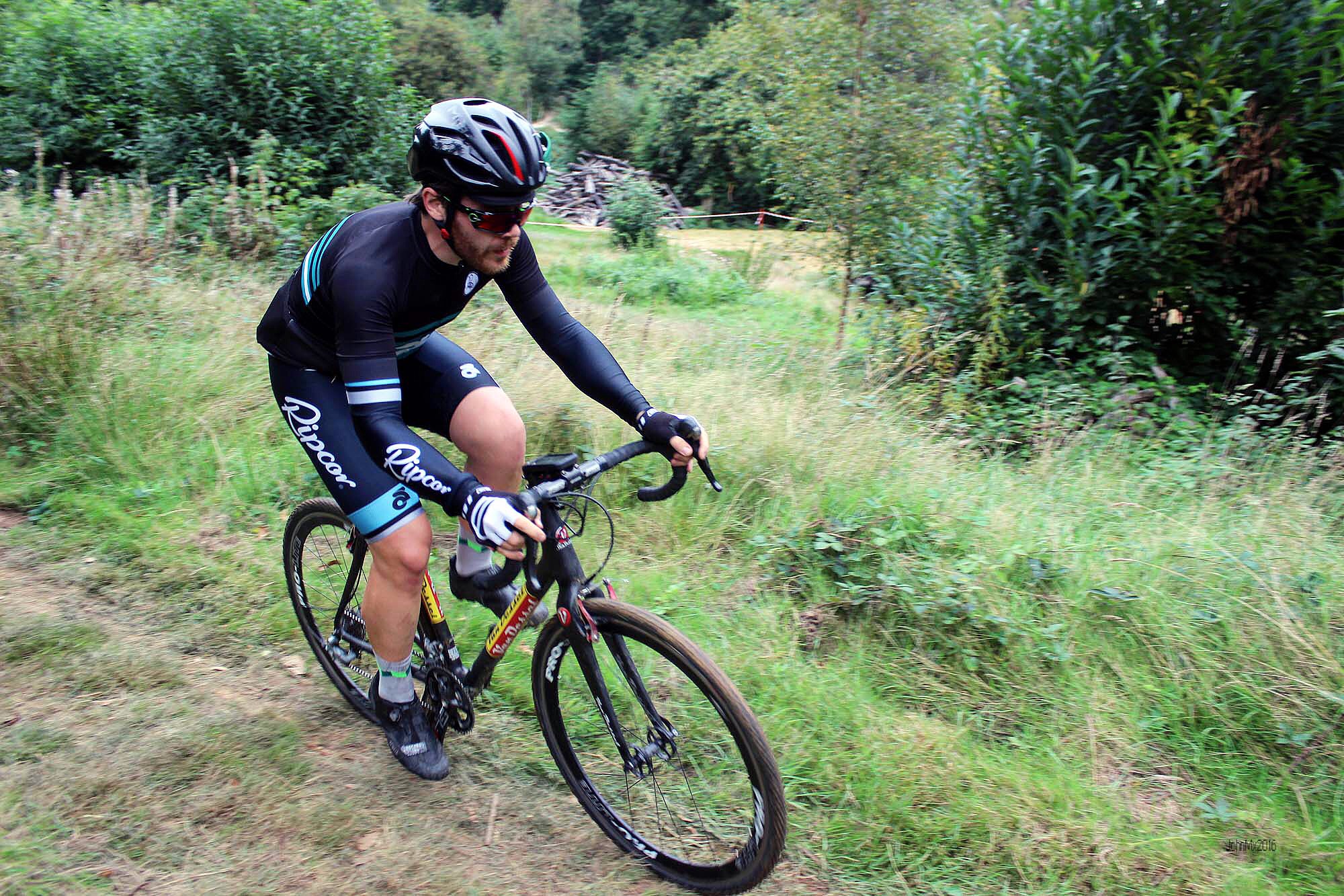 A spare jersey provided by Attacus CC helped to cover up the broken skinsuit.