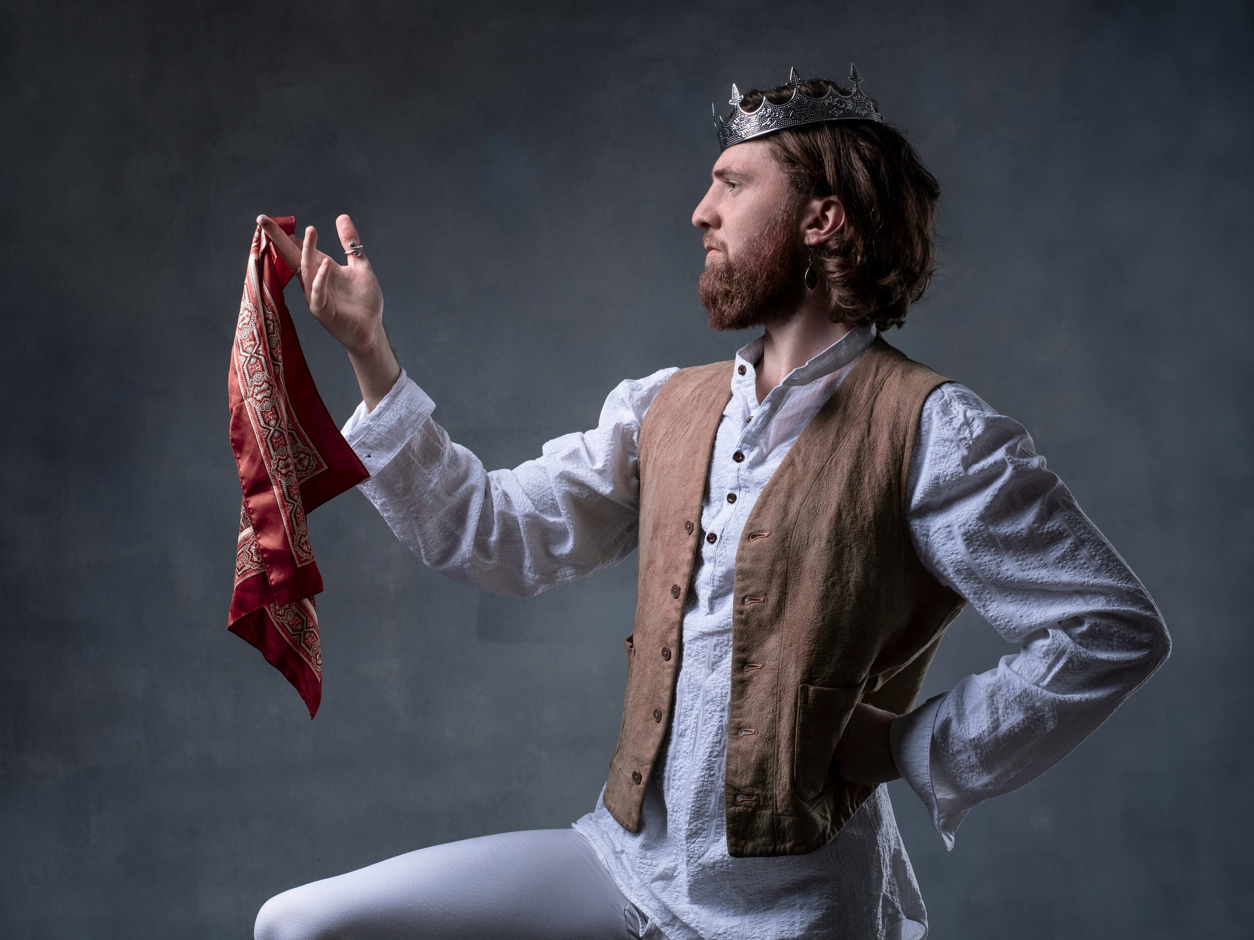 George dressed as Shakespearean Character, very flamboyant