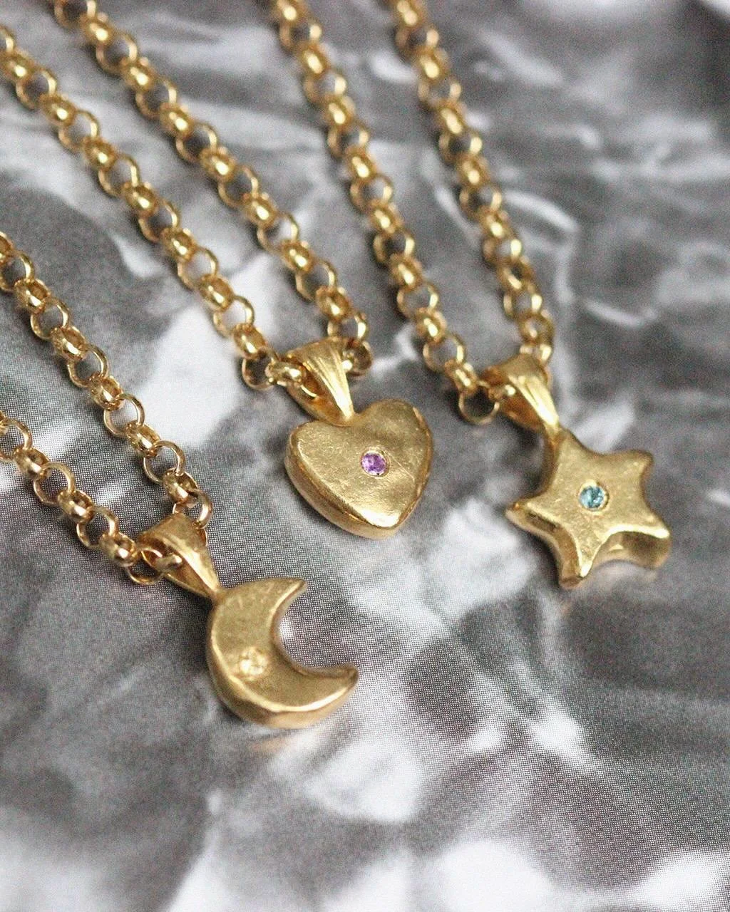 Fancy yourself a Puffy Charm necklace? ✨

Customise with your favourite gemstones and engrave a special message 🌙🌟💛