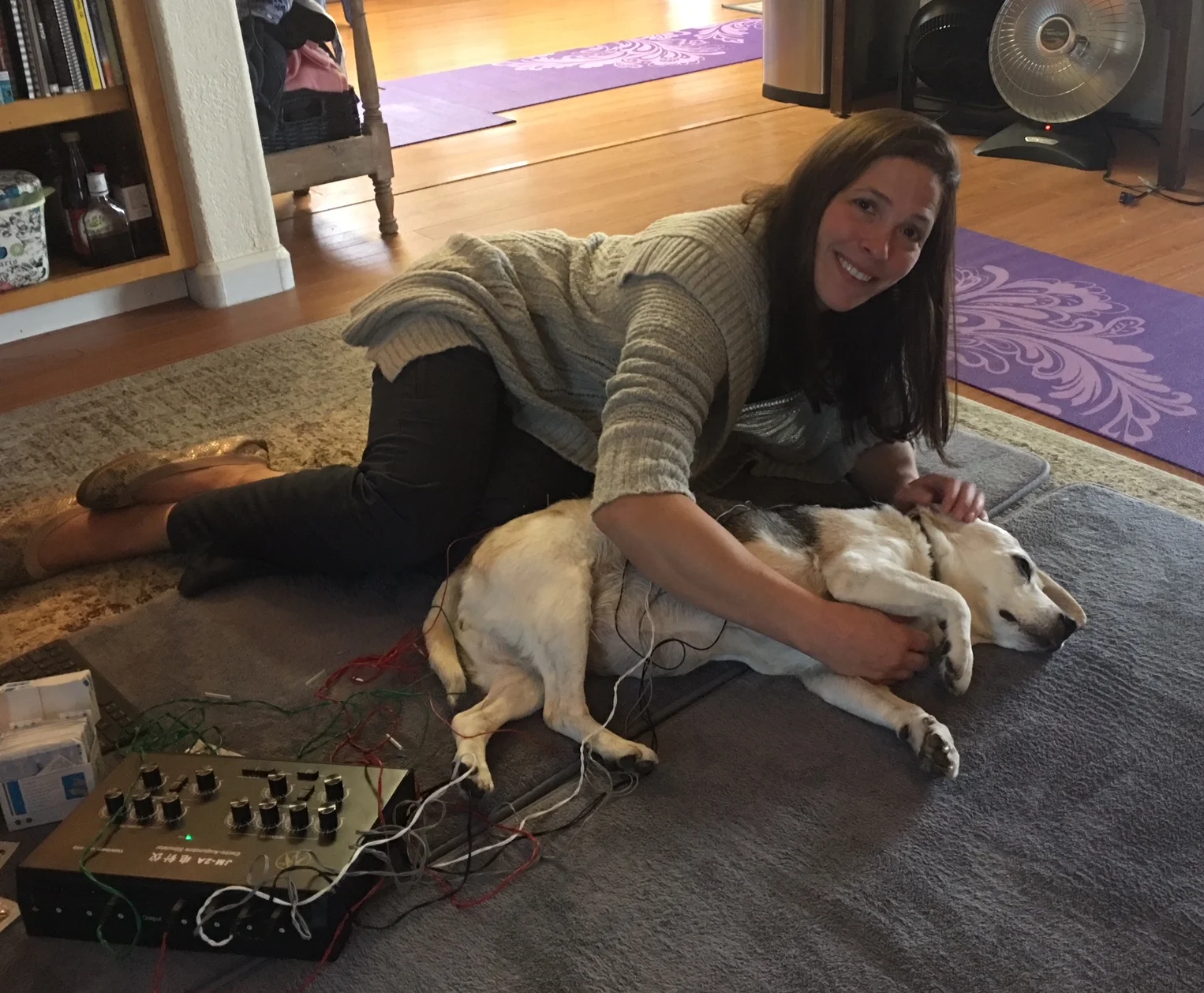 Dr. Kim with Ruby during an electroacupuncture session at Ruby's house