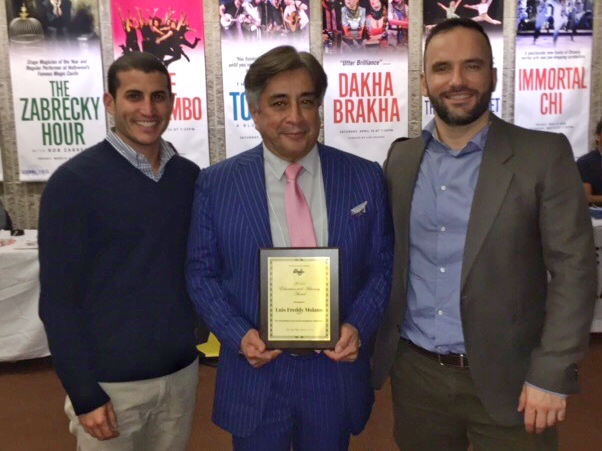 Will Mellman, Coordinator of Project AFFIRM, and Renato Barucco, Coordinator of The Program for the Study of LGBT Health, present the 2016 Education and Advocacy Award to Dr. Luis Freddy Molano.