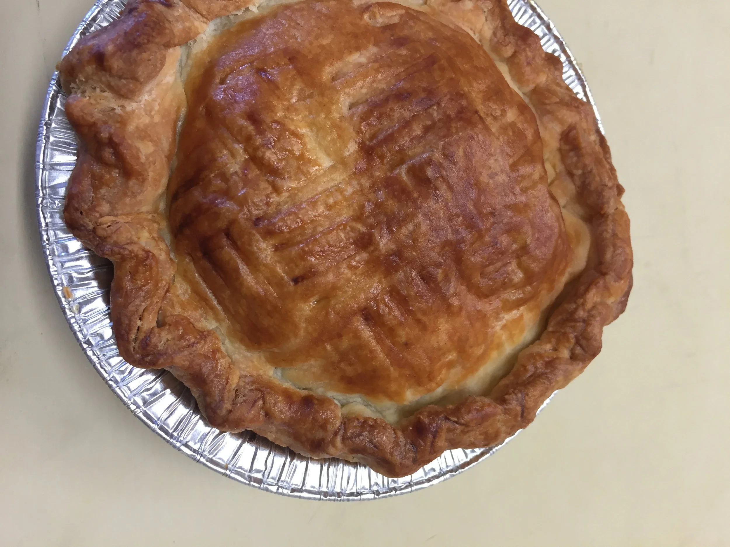 Our Farmer's Market Pot Pie features an assortment of fresh vegetables picked up throughout the week at local markets in the greater Austin area. For example, his one includes butternut squash, white and scarlet turnips, rutabagas, red and orange carrots, Crimini mushrooms, leeks, kale, garlic & herbs. Y-U-M!