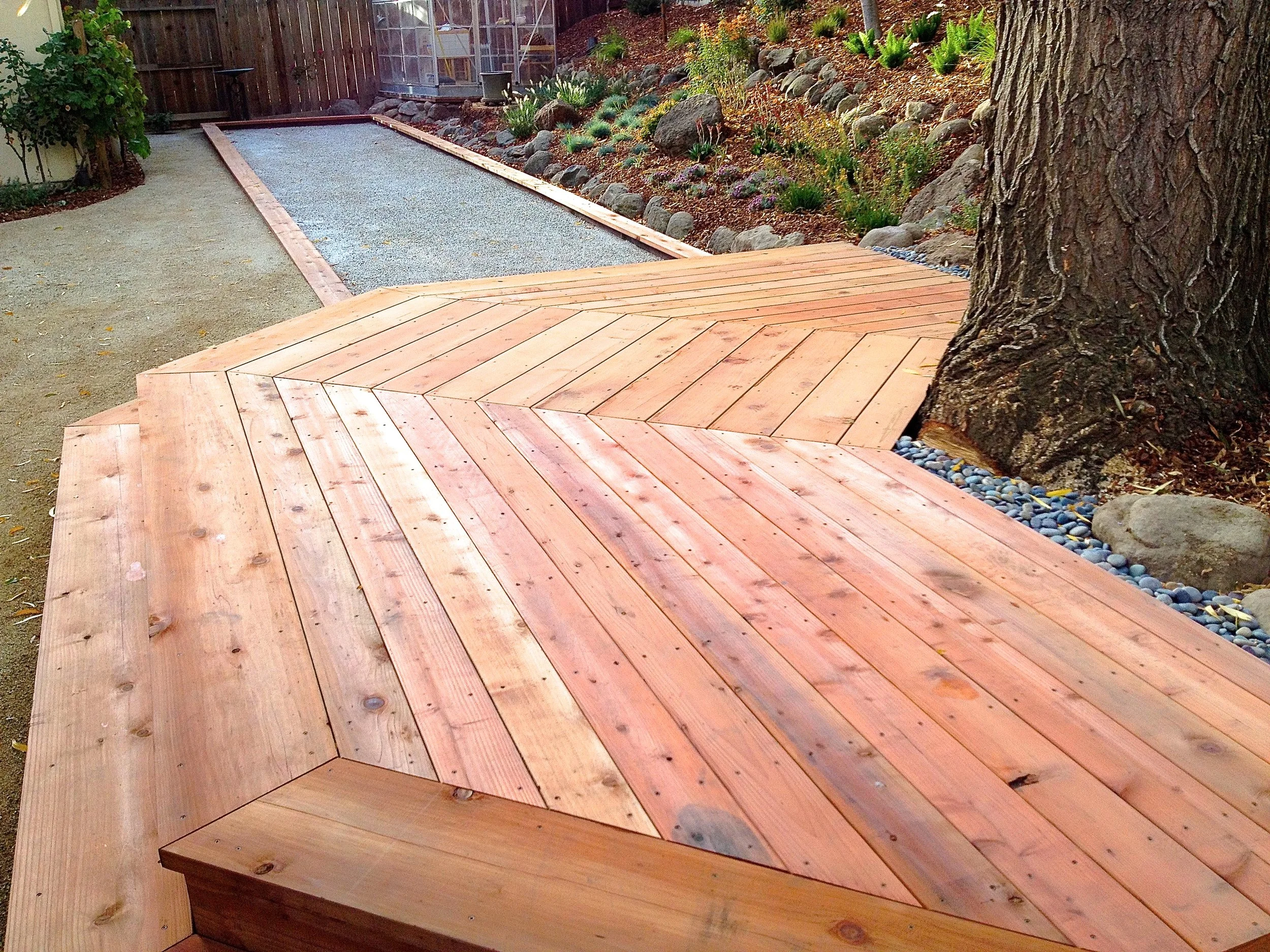 New redwood deck around a willow tree.  