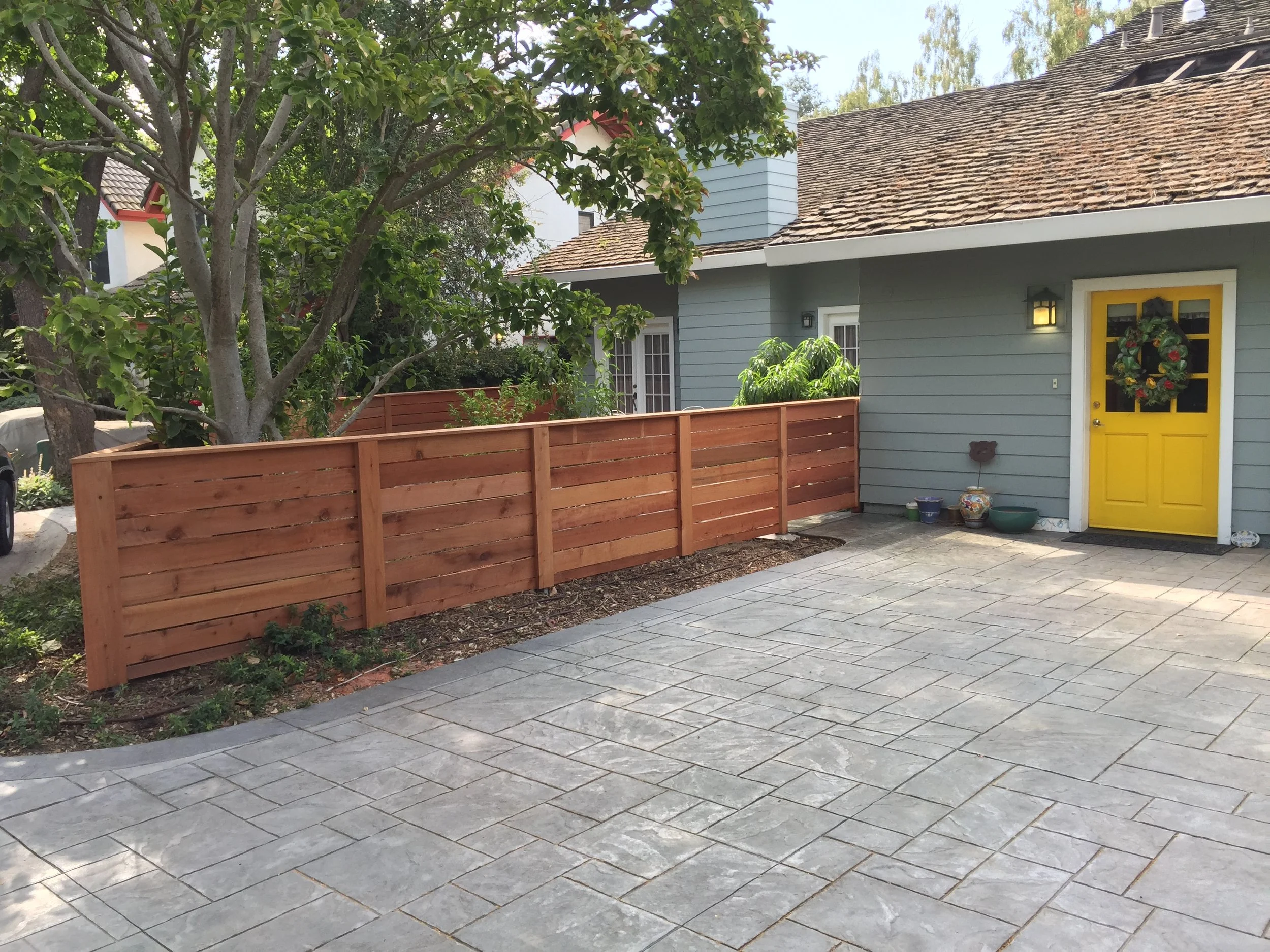  Custom redwood fence. 