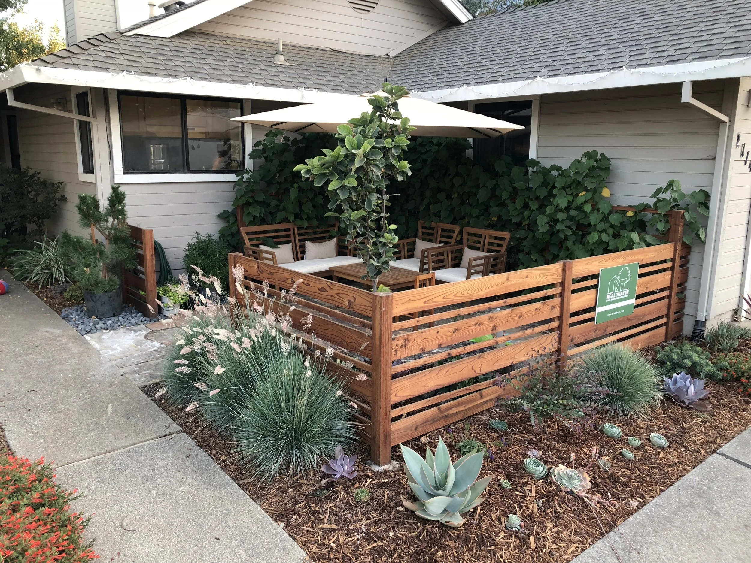  Creating a small courtyard in the front of your home adds living space and charm. 