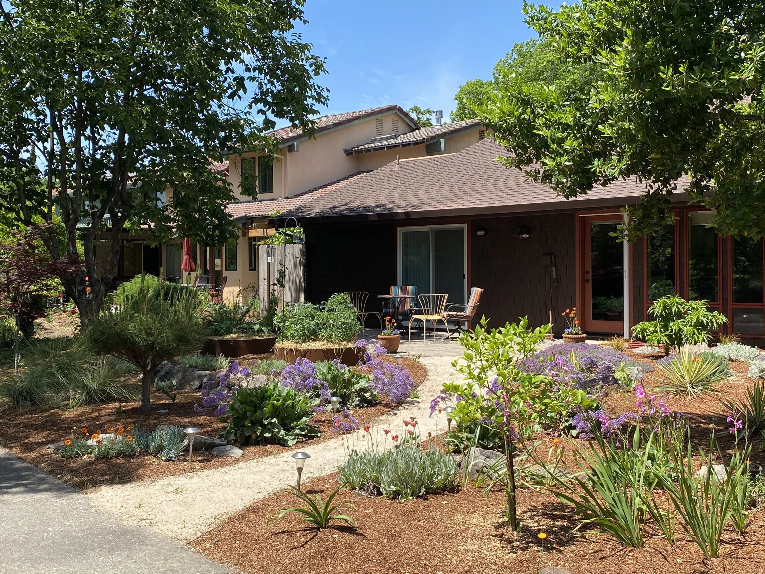  Backyard remodel, including paver patio, decomposed granite pathway, corten steel planters, plantings, irrigation and mulch. 