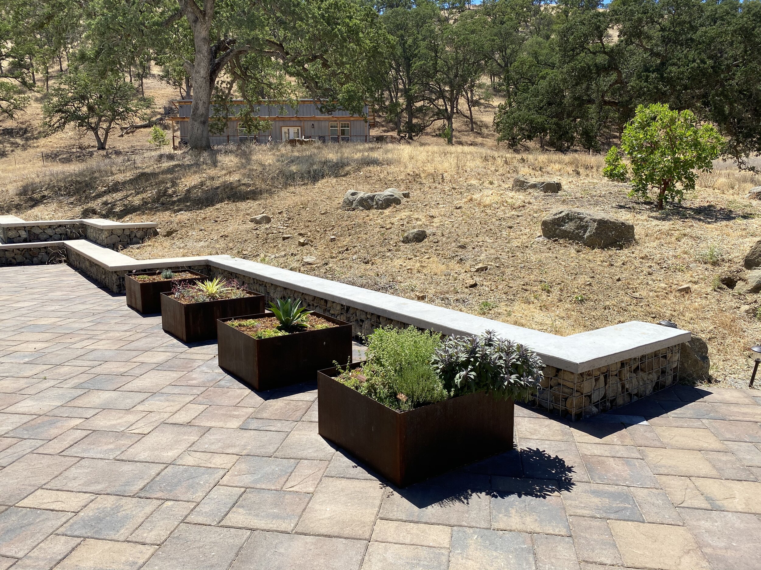  Corten steel planters and paver patio. 