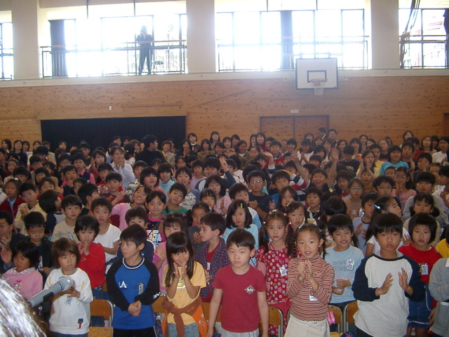 "Who wants to come here to try the violin?" All hands went up.