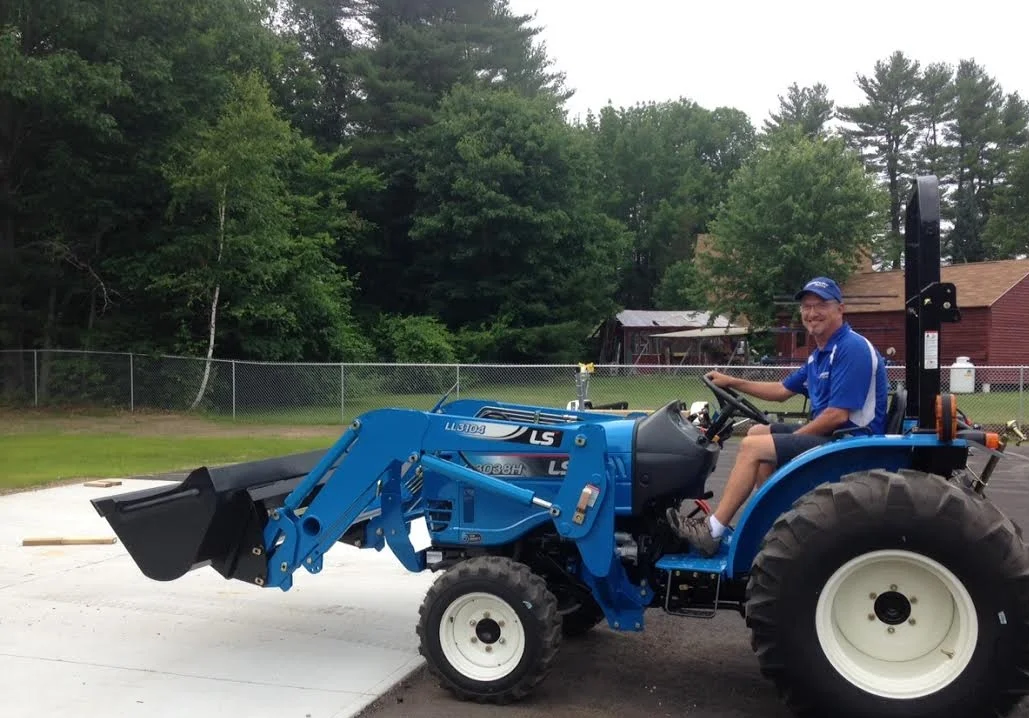 The man and his new tractor.jpg