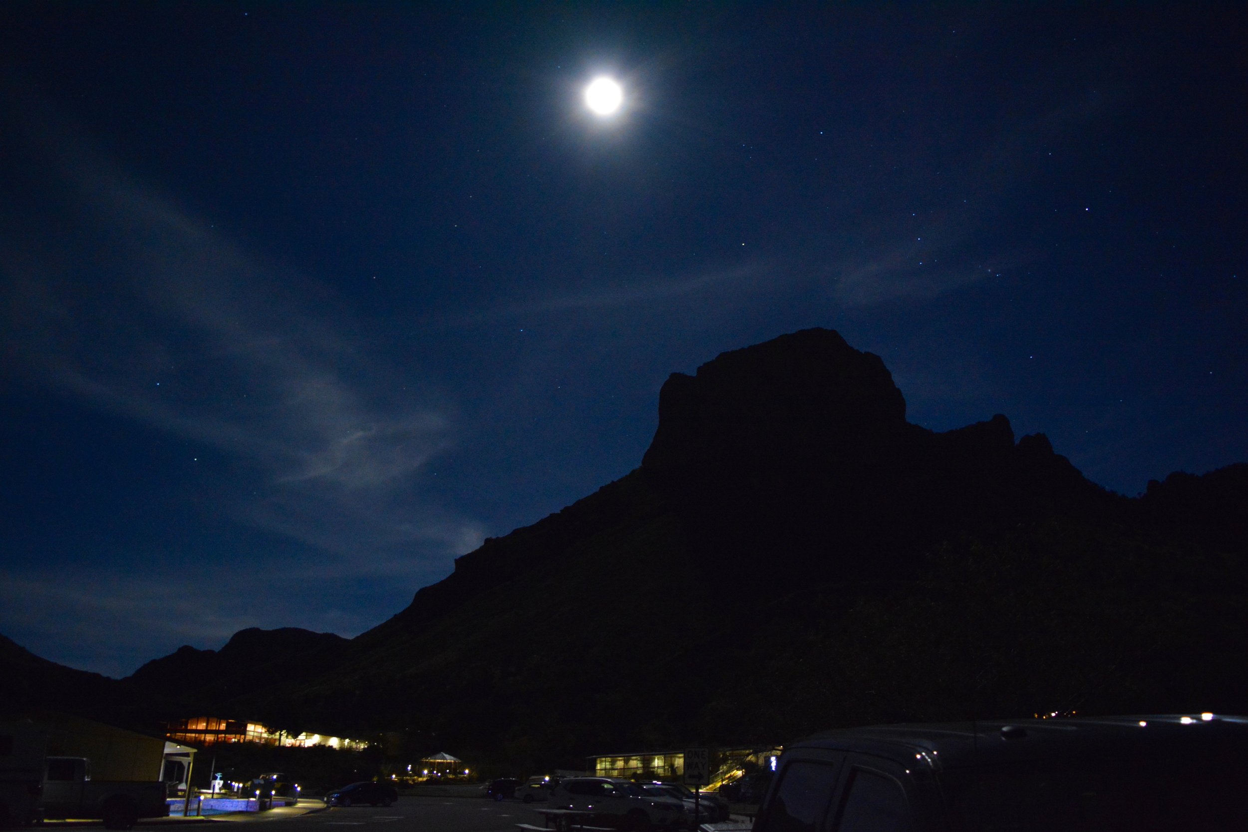 The full moon and night sky above the Chisos Mountain Lodge
