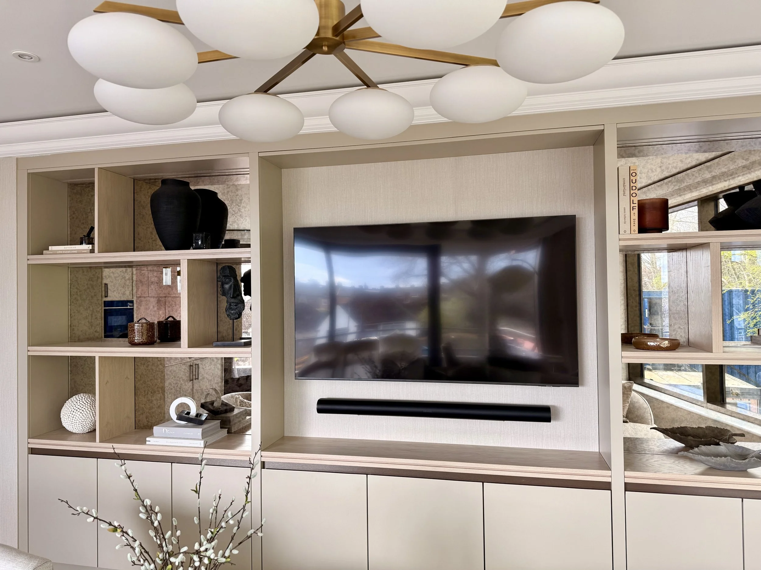 Sonos Arc Ultra and Samsung TV in media wall