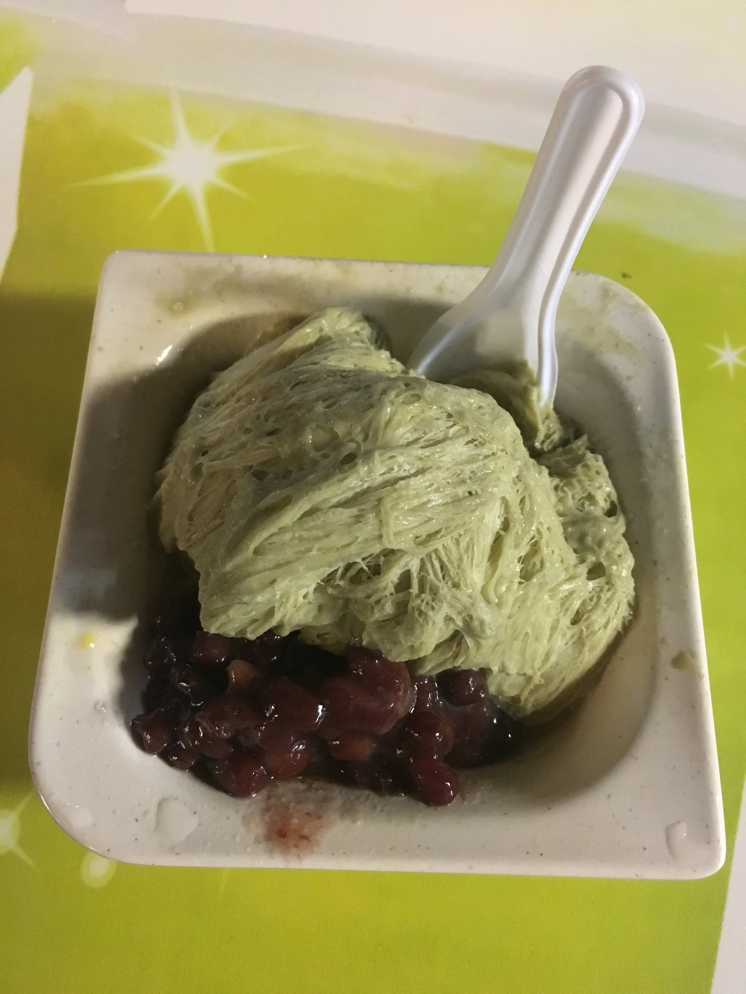Shaved green tea ice with red beans for dessert