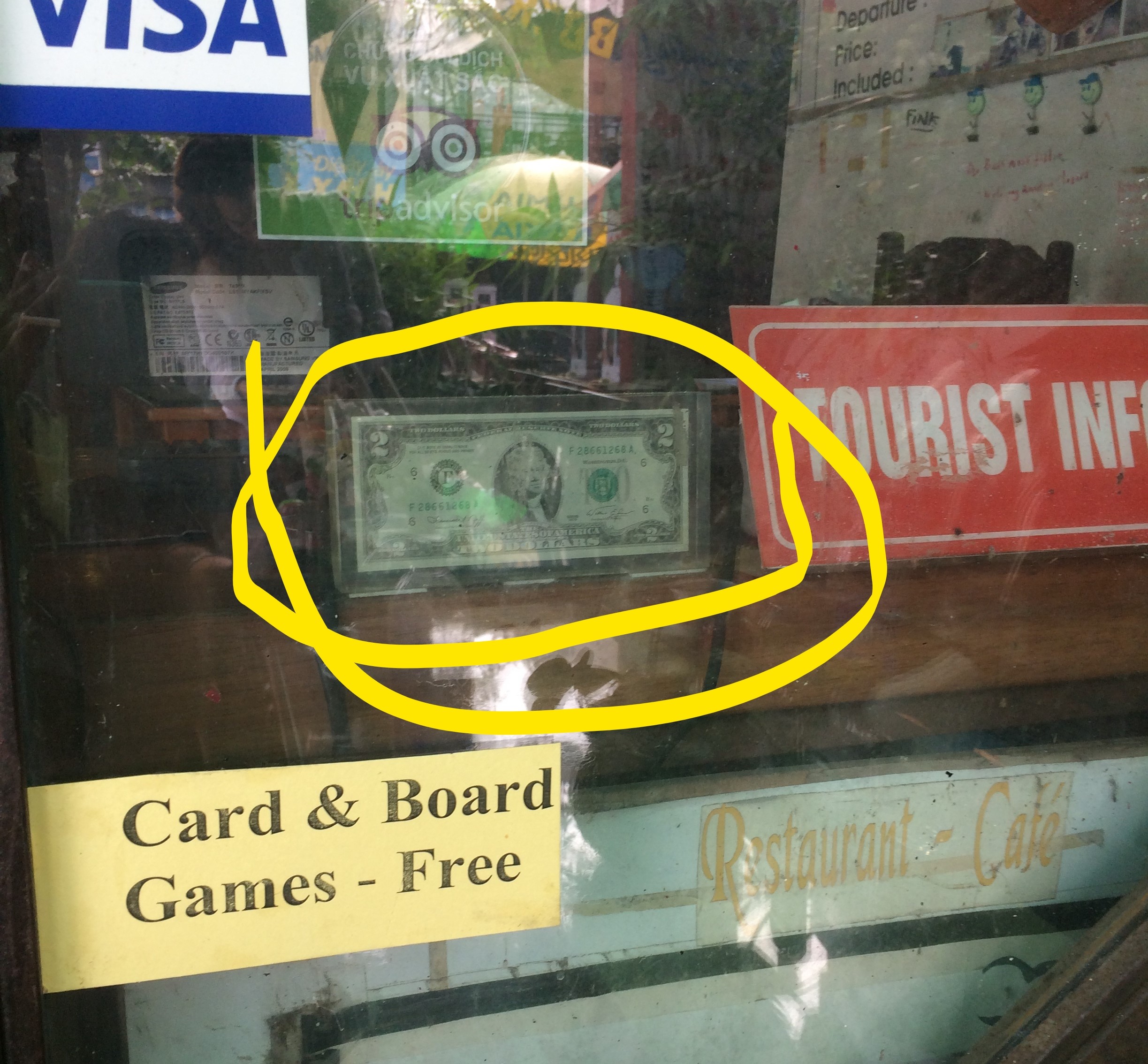 Not only do 10 year old american boys appreciate the $2 bill, so do Vietnamese! This was taped up on the glass at a restaurant in Hue, Vietnam.