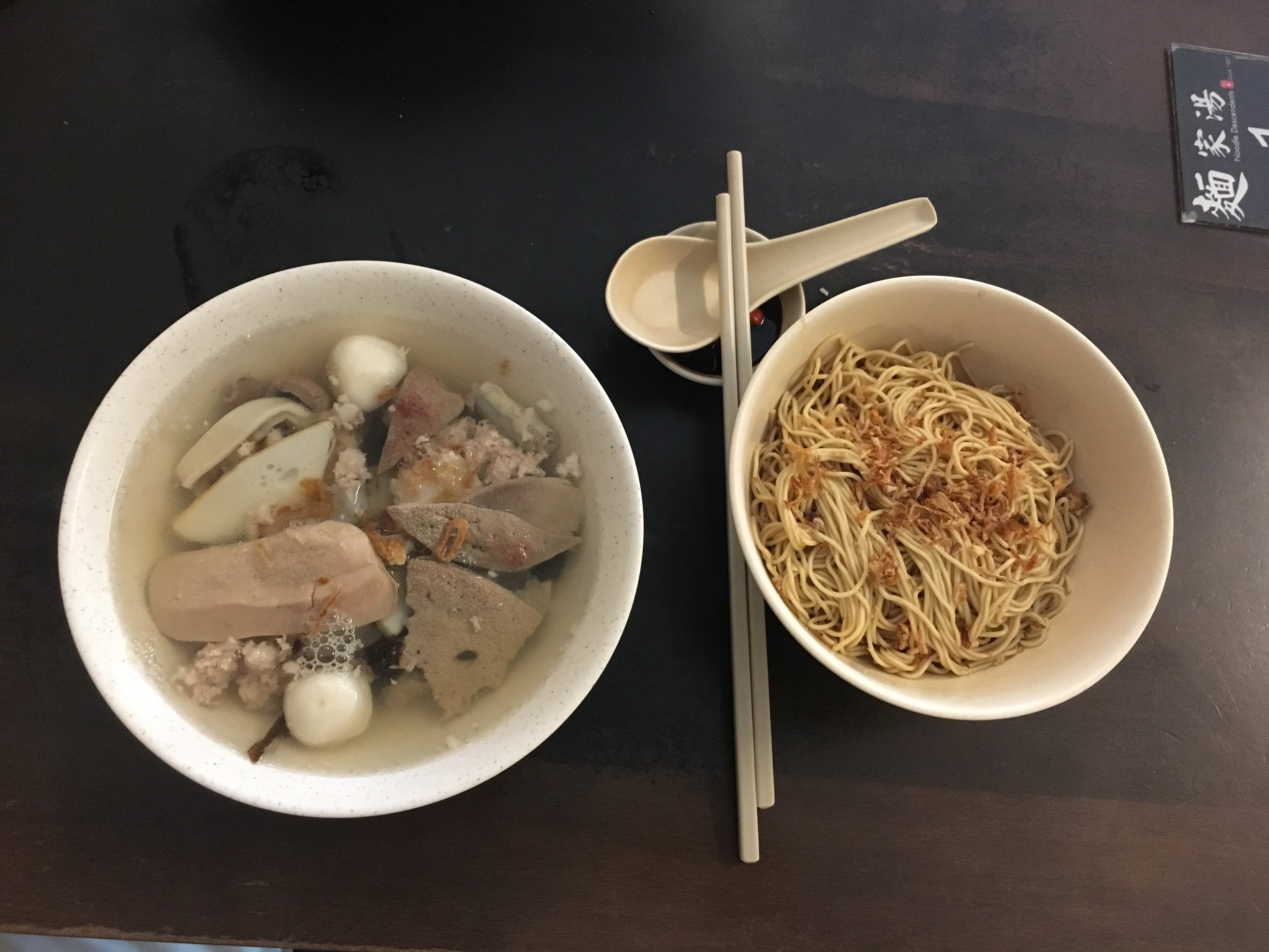 Galvin took me to a local favorite. The restaurant serves one dish - mixed pork soup, which includes lung, kidney, liver, and meat. The white balls are fish balls. 