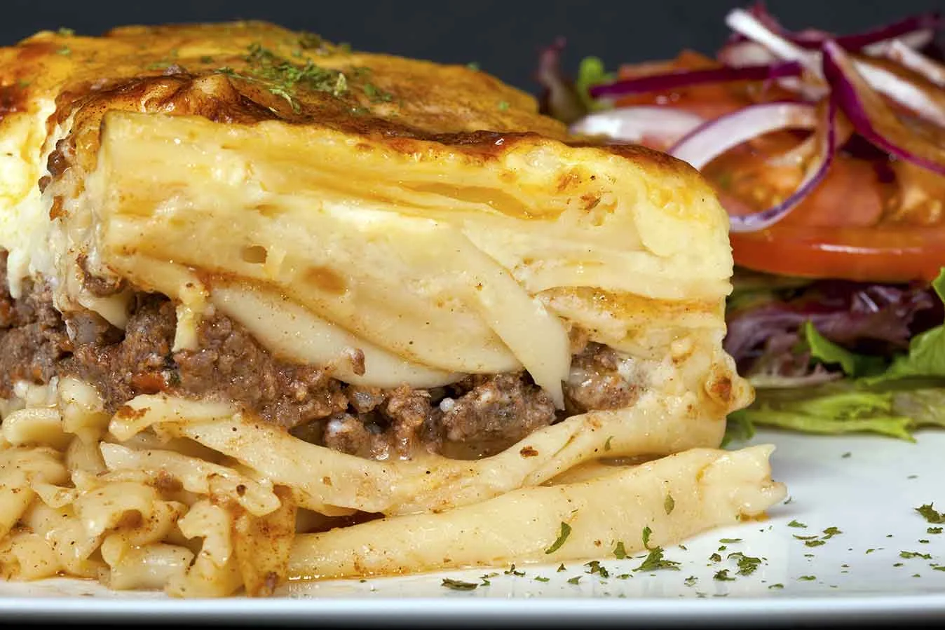 Pastitso baked pasta dish including ground beef and béchamel sauce in its best-known form