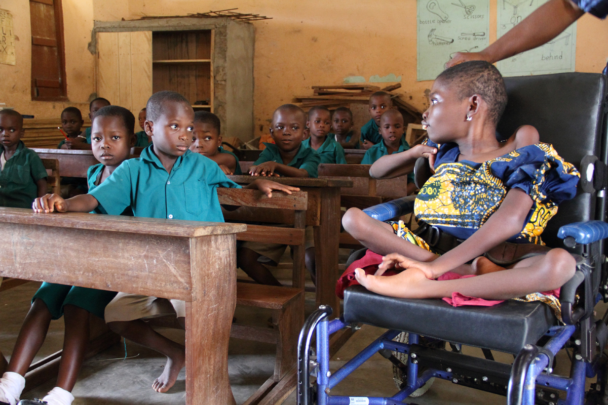Class begins and Mawunyo was very interested. We left Mawunyo in class at this point to let the teacher work with the students. As we waited outside, we could hear Mawunyo talking, asking questions, and telling her classmates to KEEP QUIET!