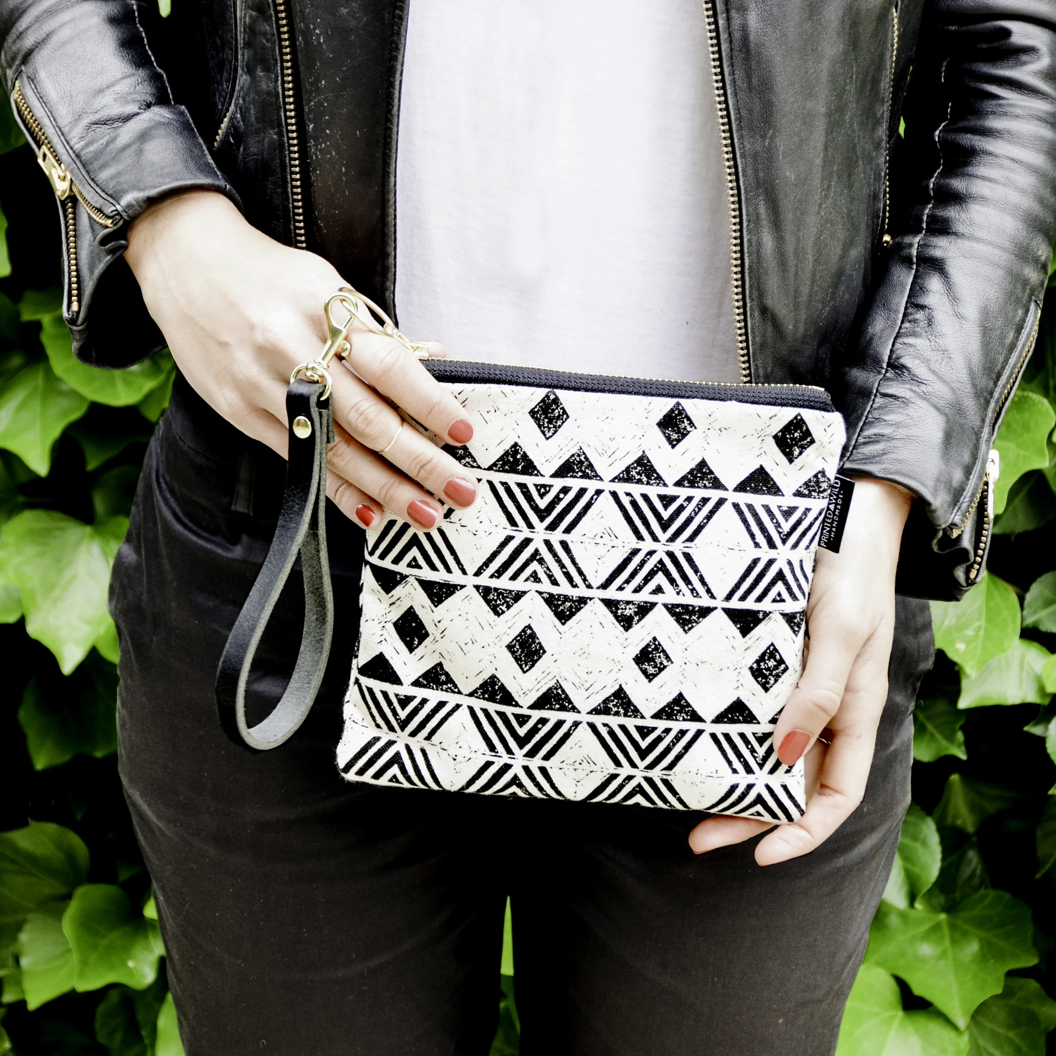 Printed Wild Square Clutch with black and white screen-printed plant pattern handmade in Washington, D.C with certified organic material