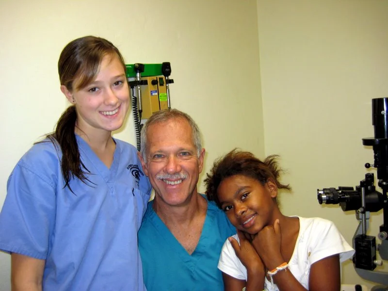Dr. Hatsis, daughter and satisfied patient