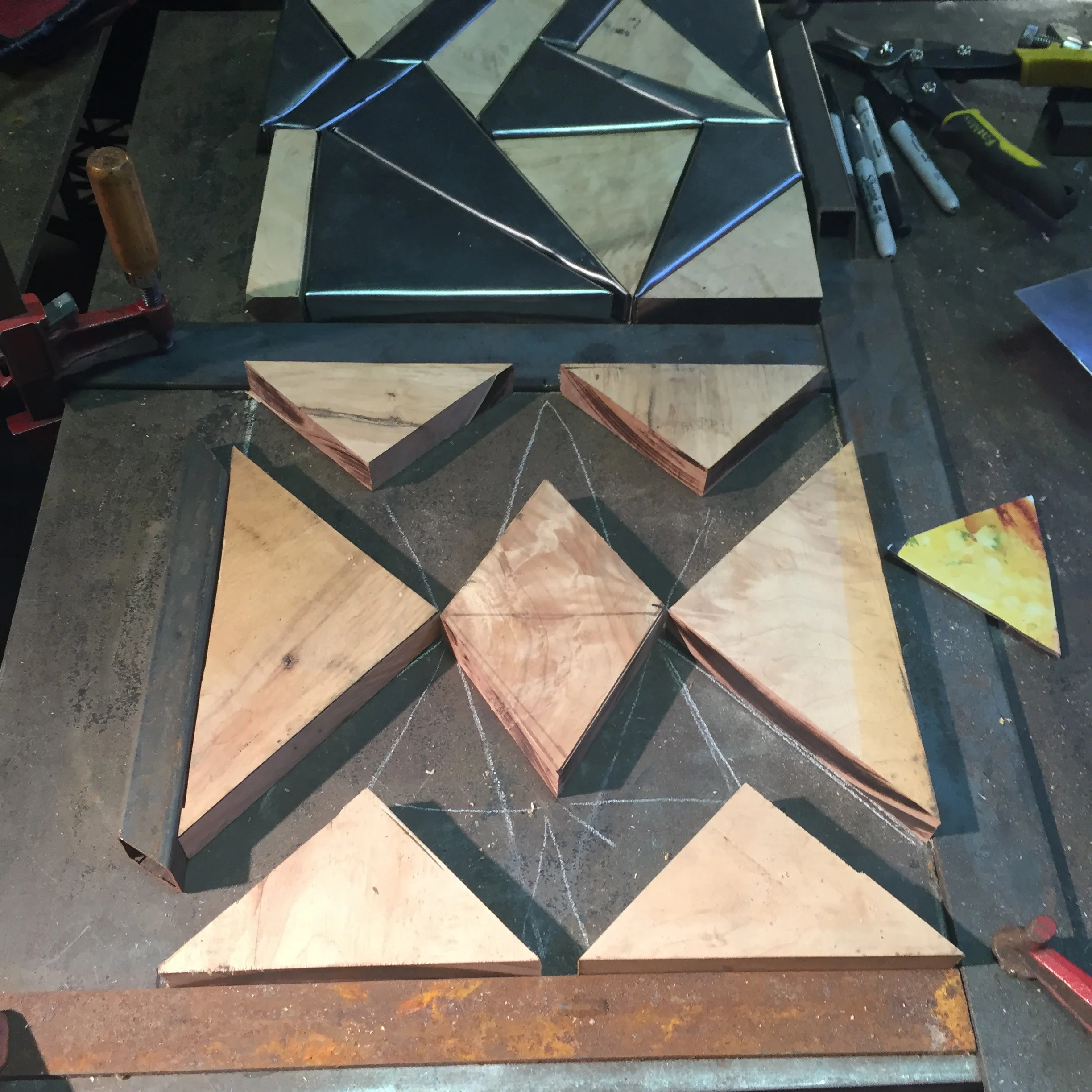 first i trace the layout on the table and cut the wood 