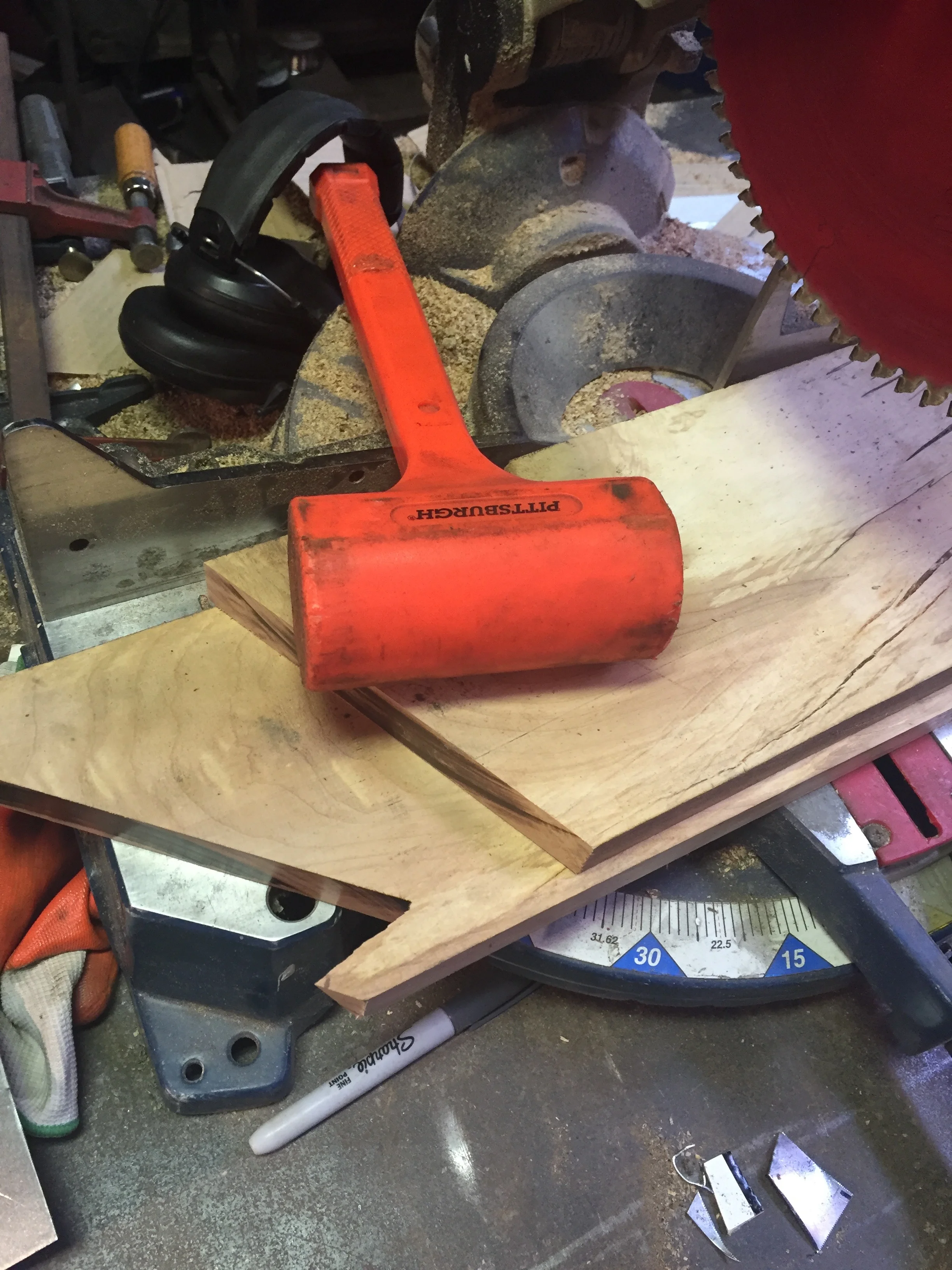we used tiger maple for this set of tables. the deadweight hammer is great for bending thin metal because it doesn't leave marks on the surface. 