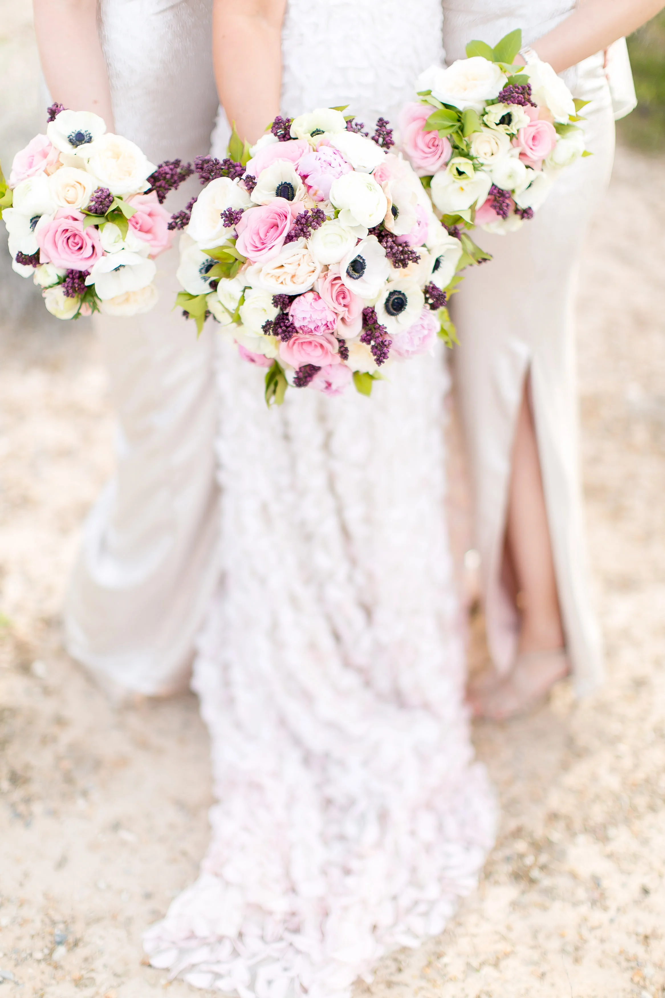 Las Vegas wedding at the Springs Preserve. Florals of white, pink and purple by Layers of Lovely. Photography by J. Anne Photography.