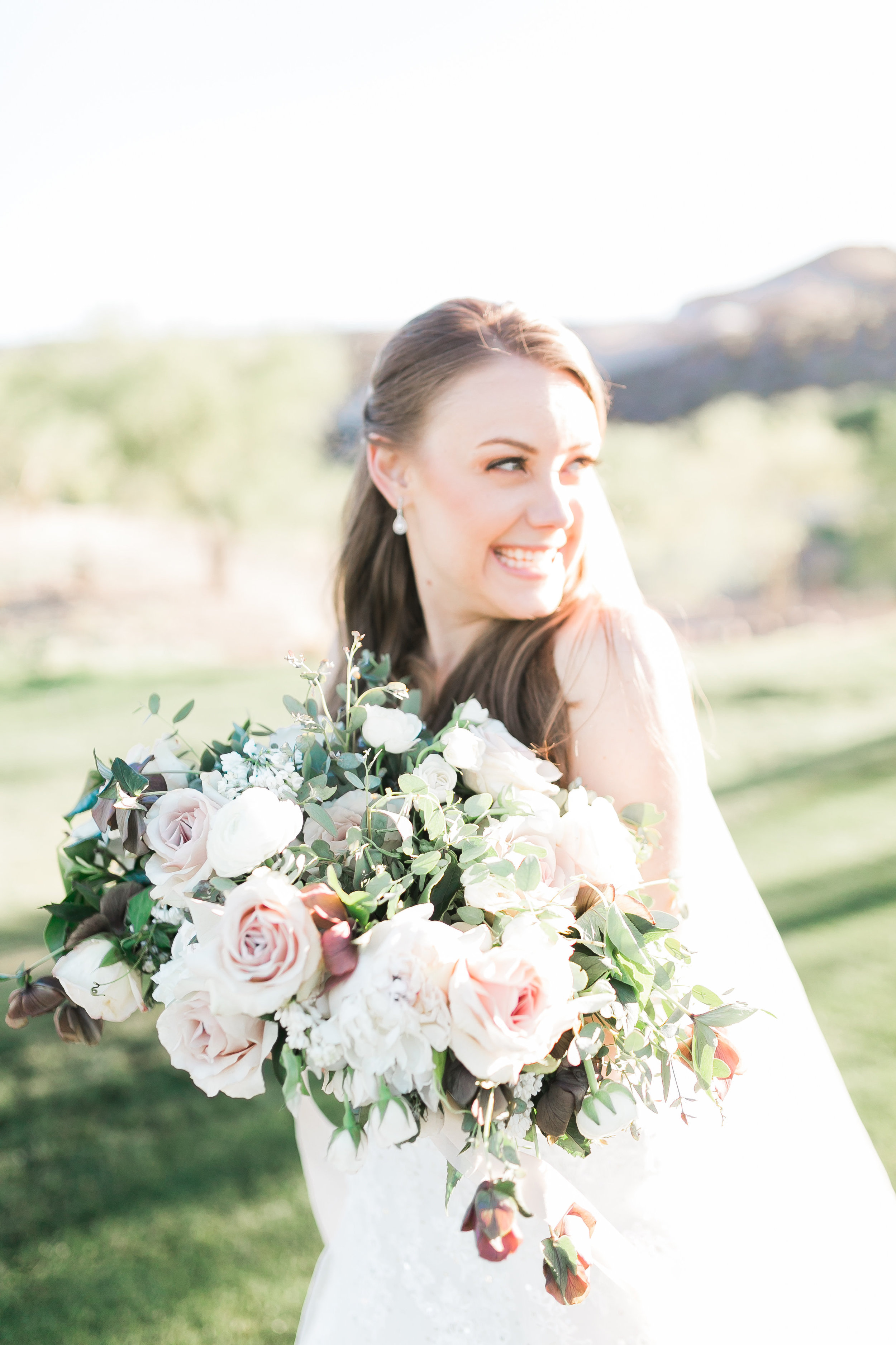Spring bridal bouquet with blush and mauve blooms by Layers of Lovely 