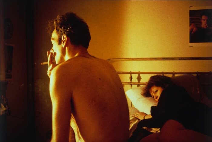 Nan and Brian in Bed, New York City. 1983. Silver dye bleach print, printed 2006, 15 1/2 x 23 3/16″ (39.4 x 58.9 cm). The Museum of Modern Art, New York. Acquired through the generosity of Jon L. Stryker. (C) 2016 Nan Goldin