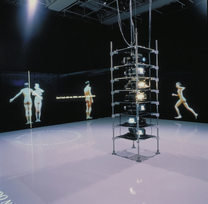 Teiji Furuhashi (Japanese, 1960–1995). Lovers. 1994. Computer controlled, five-channel laser disc/sound installation with five projectors, two sound systems, two slide projectors, and slides (color, sound). Overall 32′ 10″ x 32′ 10″. The Museum of Modern Art, New York. Gift of Canon Inc., 1998. © 2016 Dumb Type.