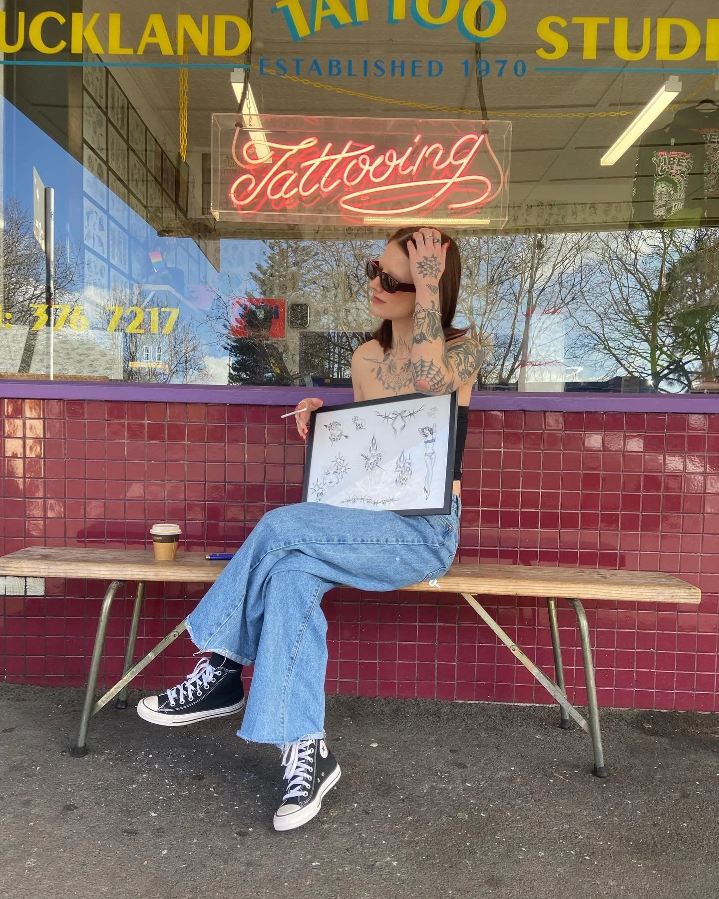 Just a girl and her tattoo flash 💘 Come on down to @aucklandtattoostudio to check out our extensive collection of ready to go designs or have a chat about a custom tattoo!