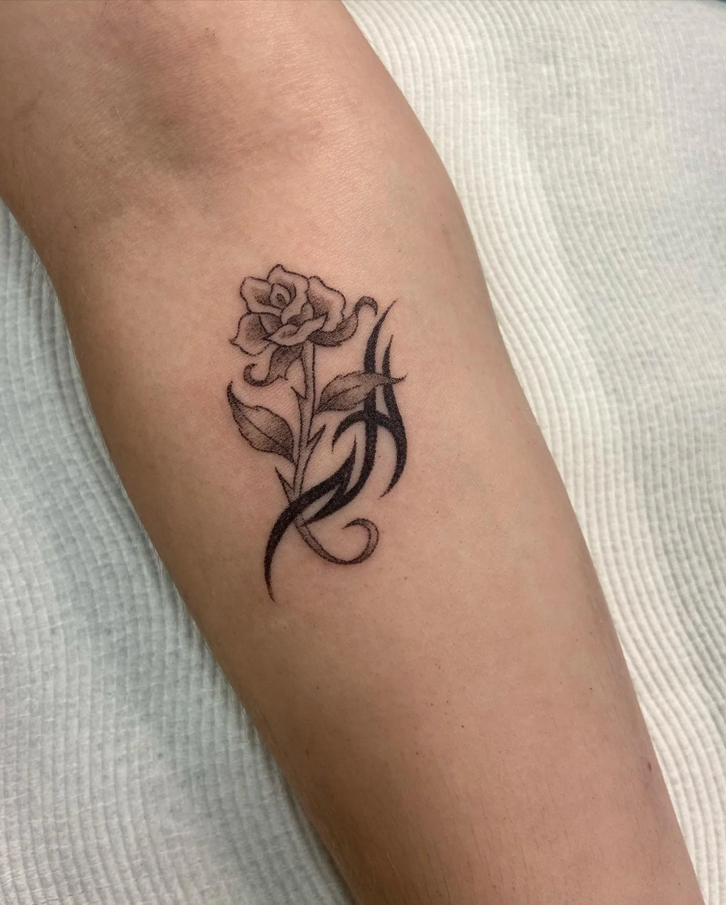 The coolest choice for Jess&rsquo;s first tattoo 🌹 Hand poked of Halloween from my flash! I would love to do more like this @aucklandtattoostudio