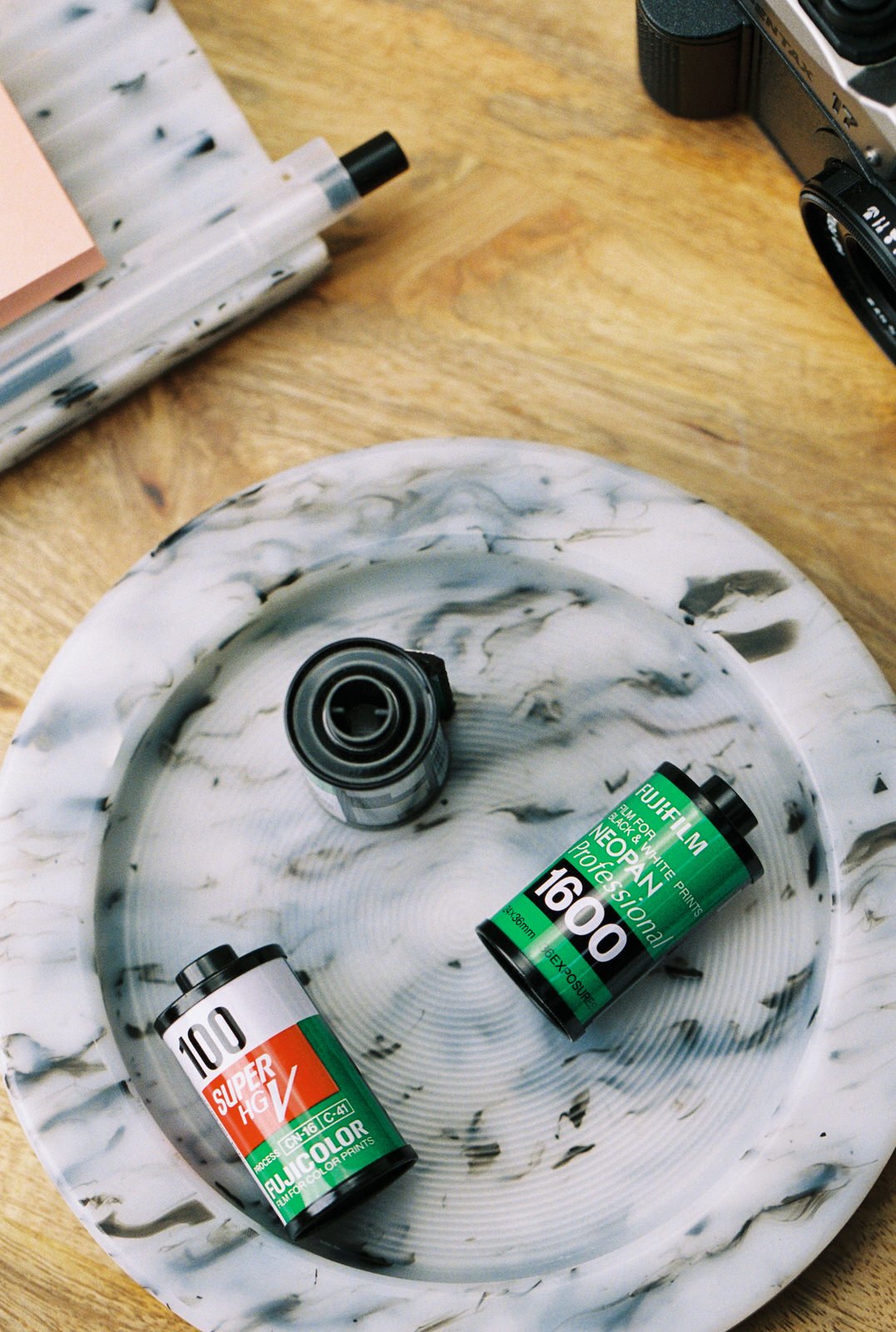 No.50 recycled film tray holding Kodak and Ilford film rolls