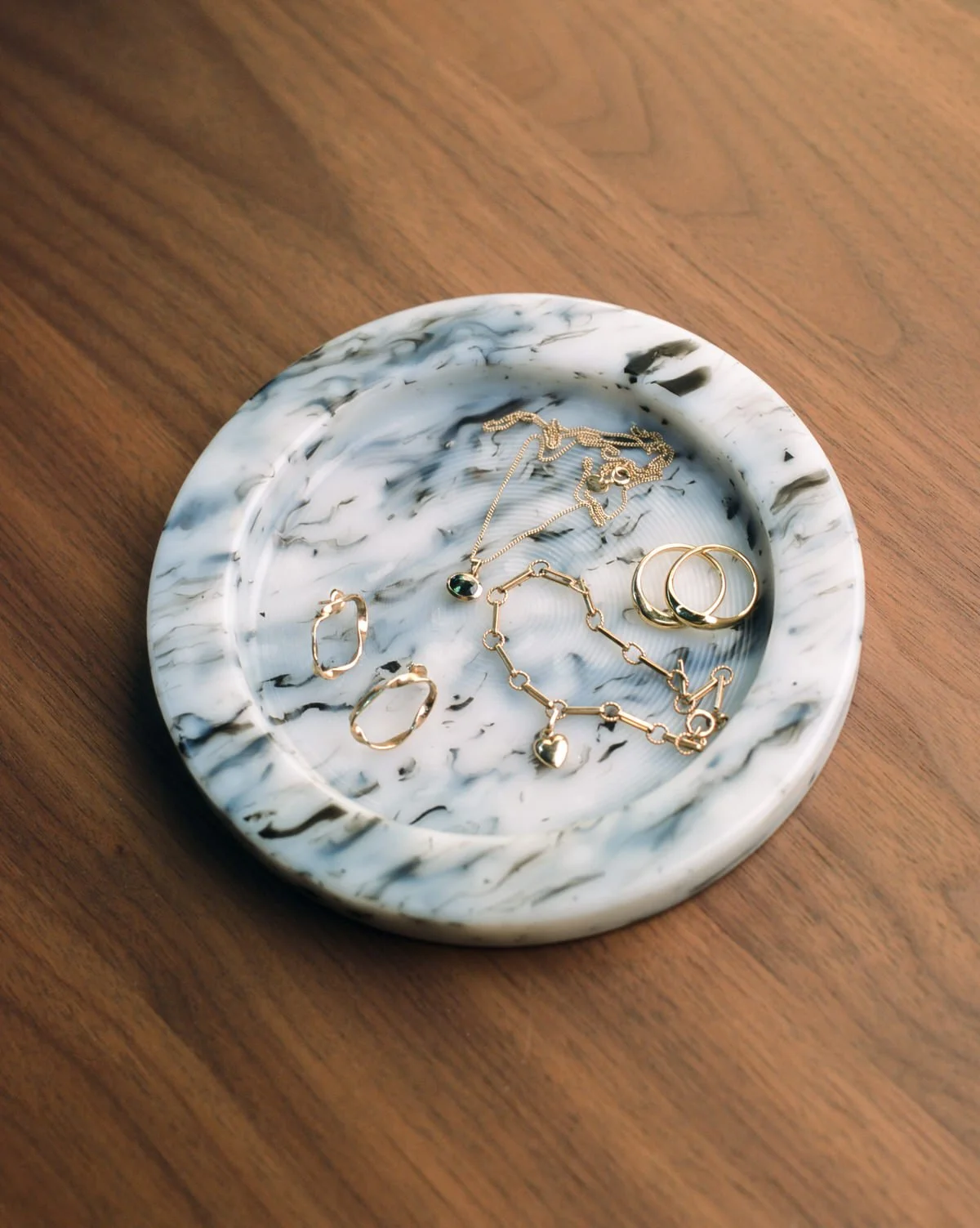 No.50 recycled film jewellery tray holding gold jewellery